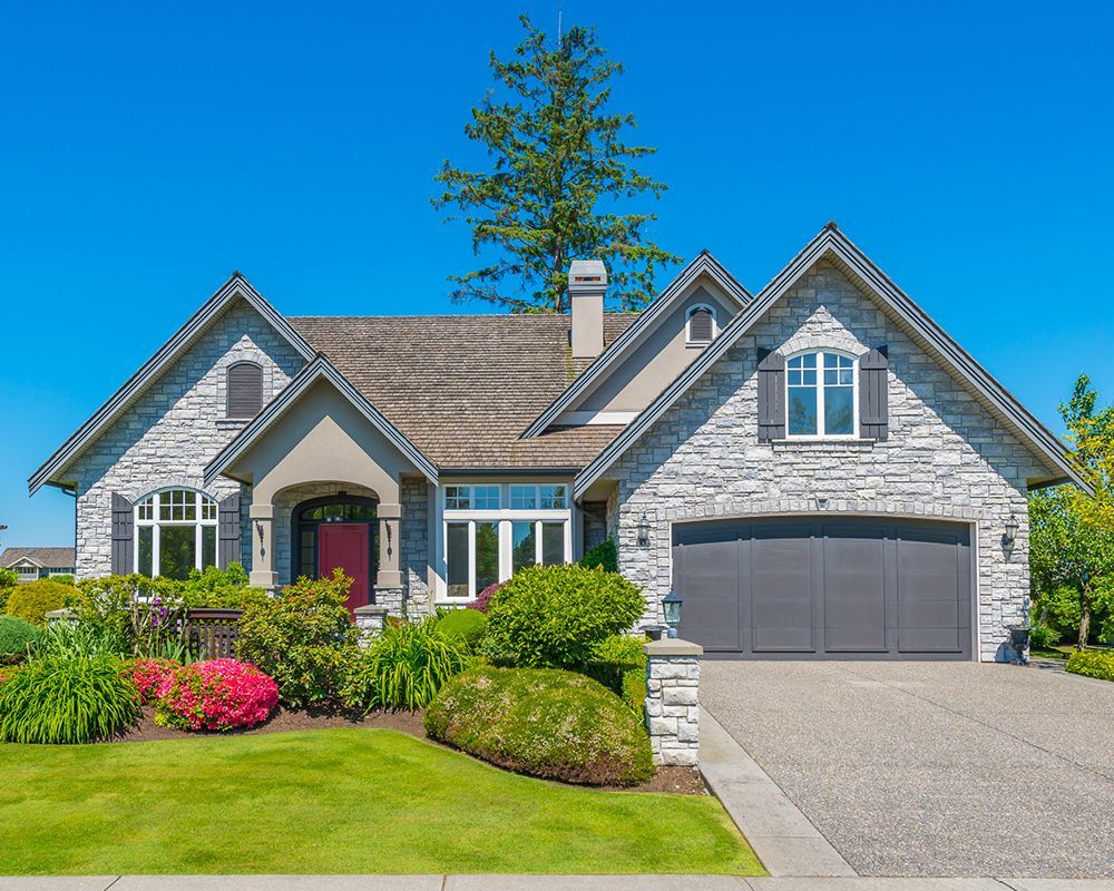 Stone House with a Large Garage