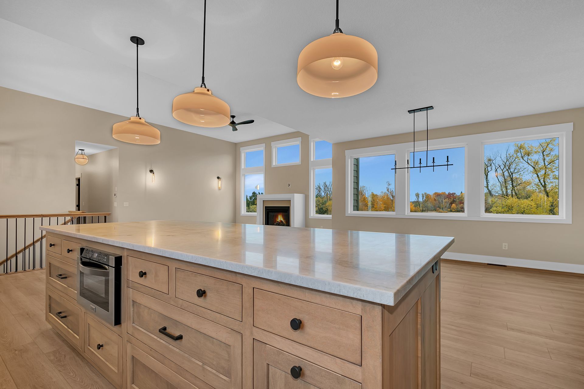 There is a large island in the middle of the kitchen.