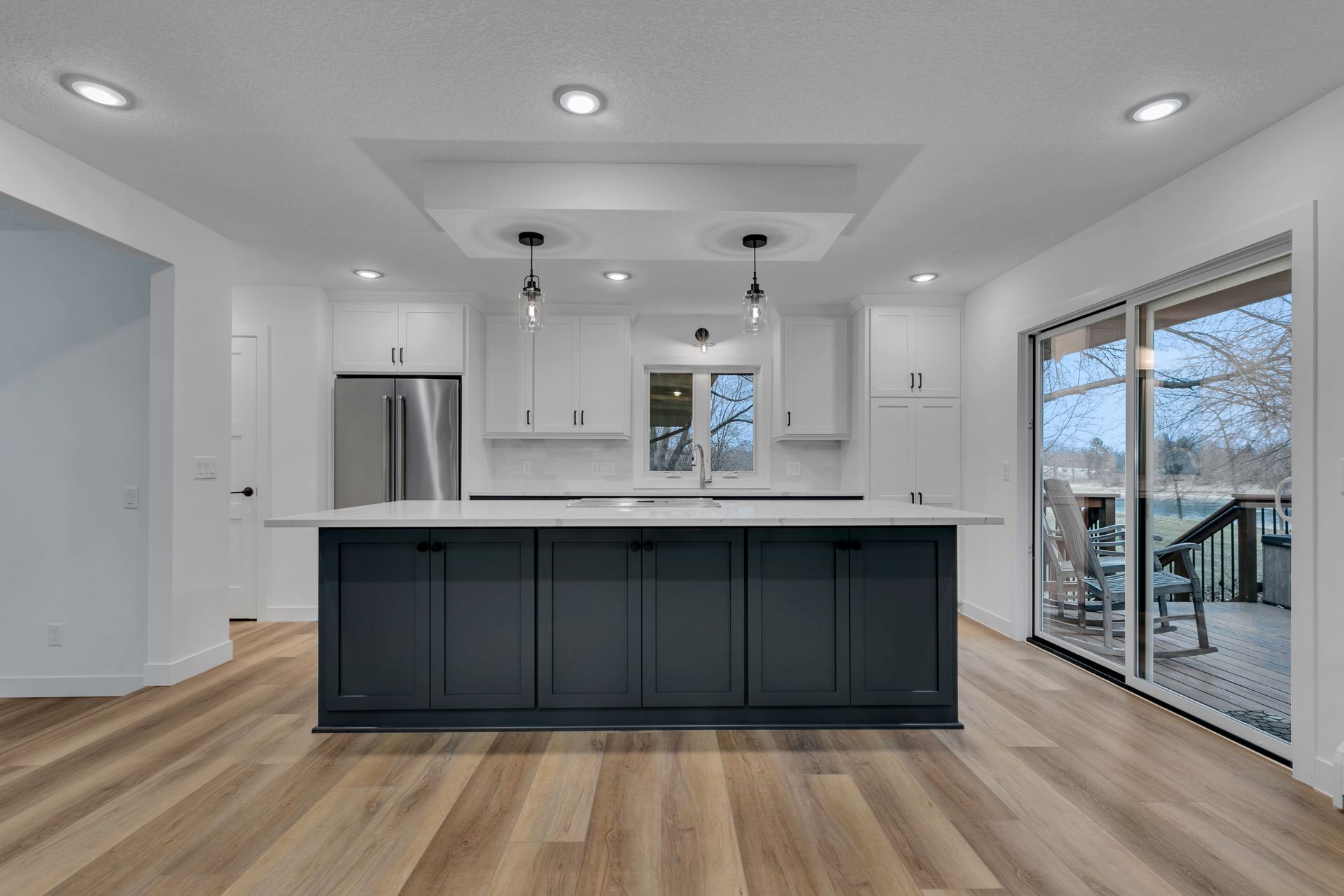 There is a large island in the middle of the kitchen.