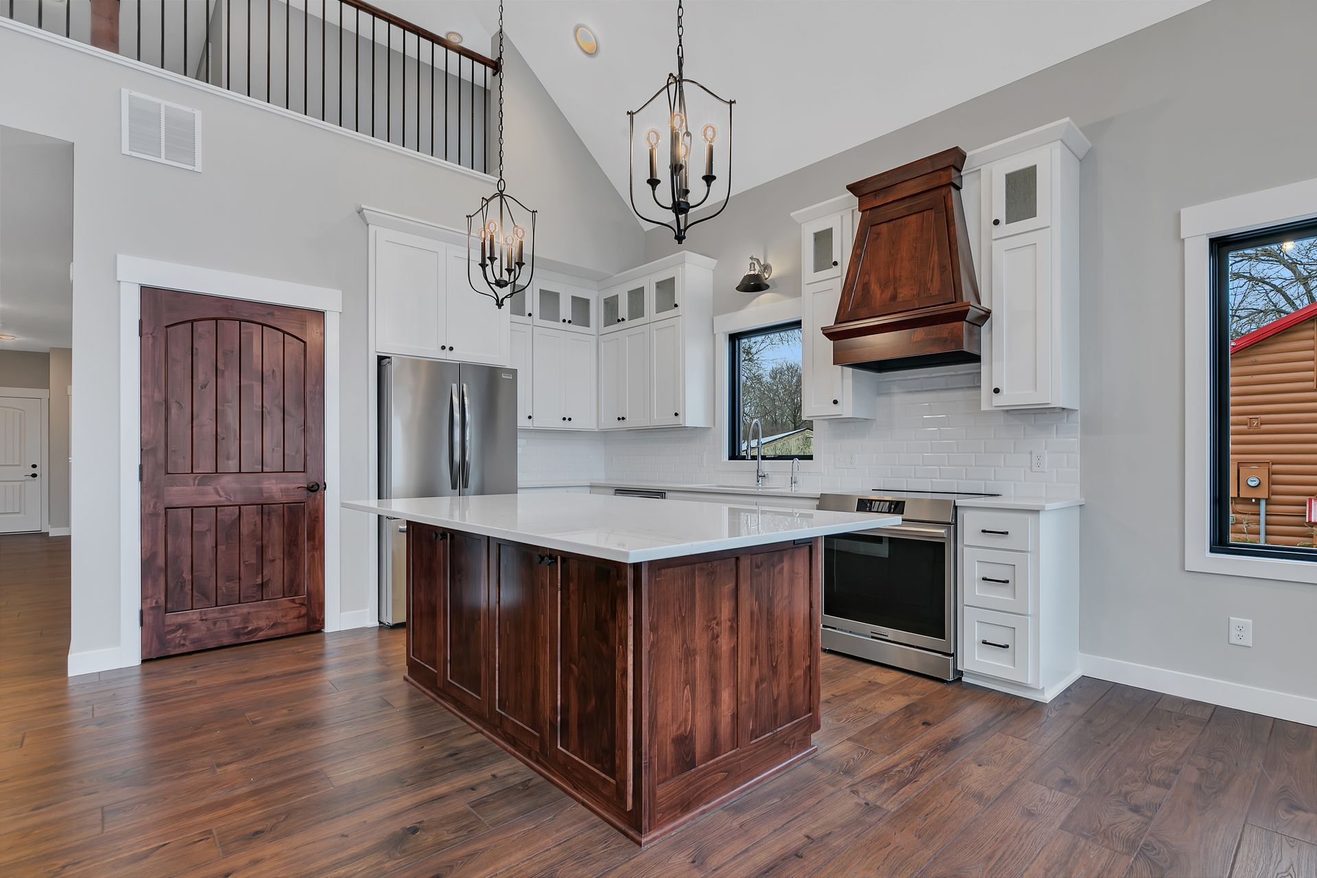 There is a large island in the middle of the kitchen.