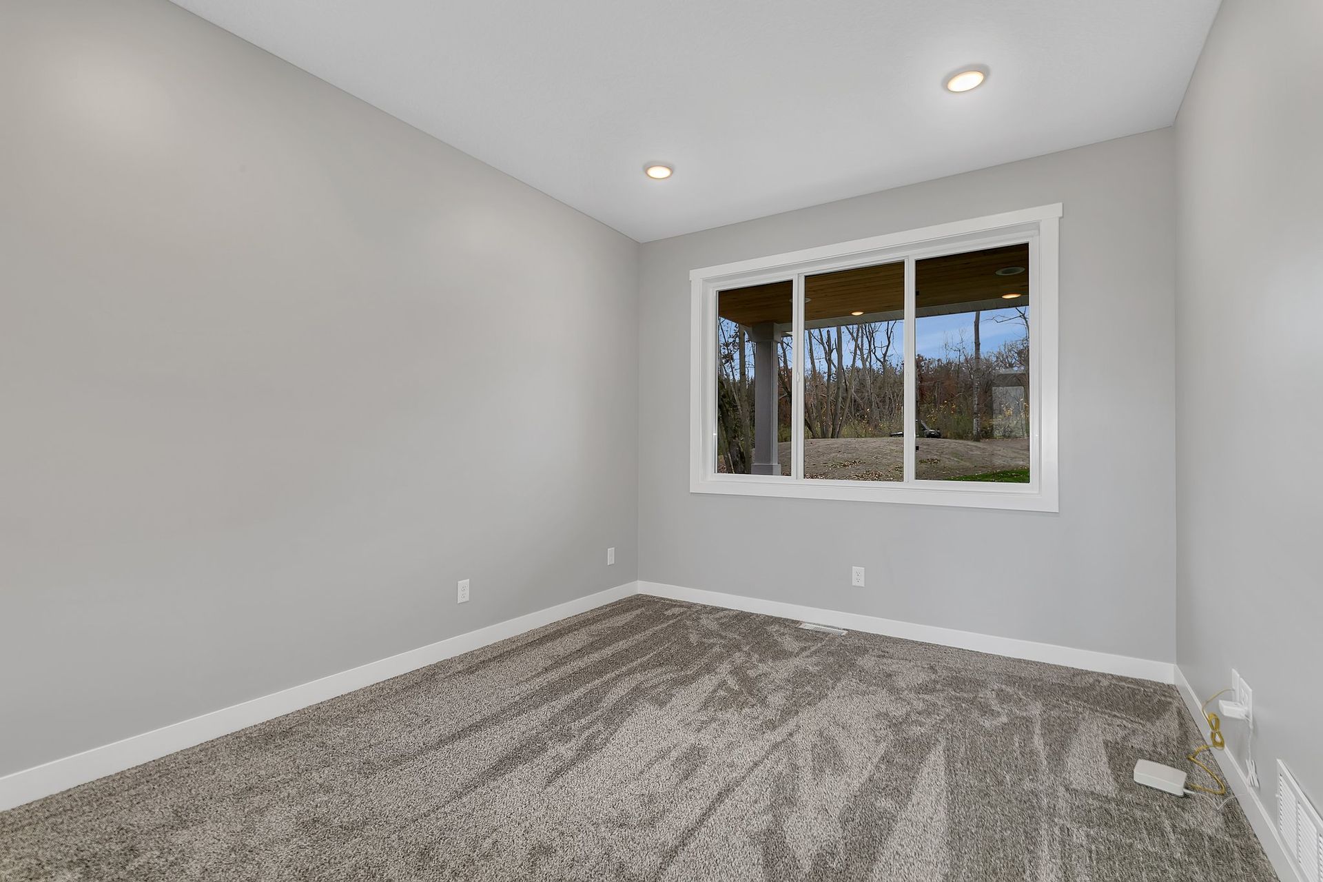 There is a large window in the middle of the room.
