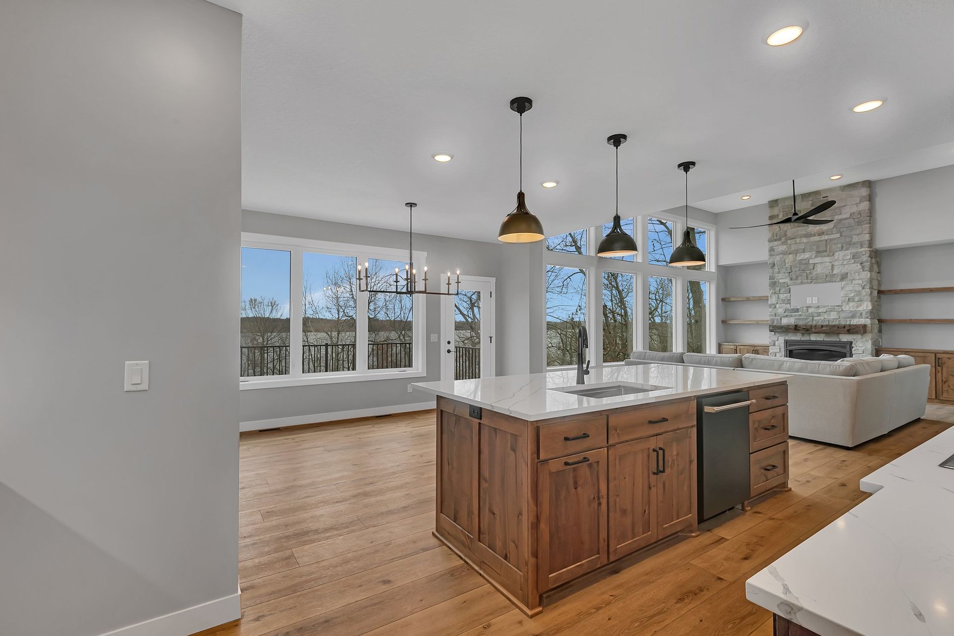 A kitchen with a large island in the middle of the room.