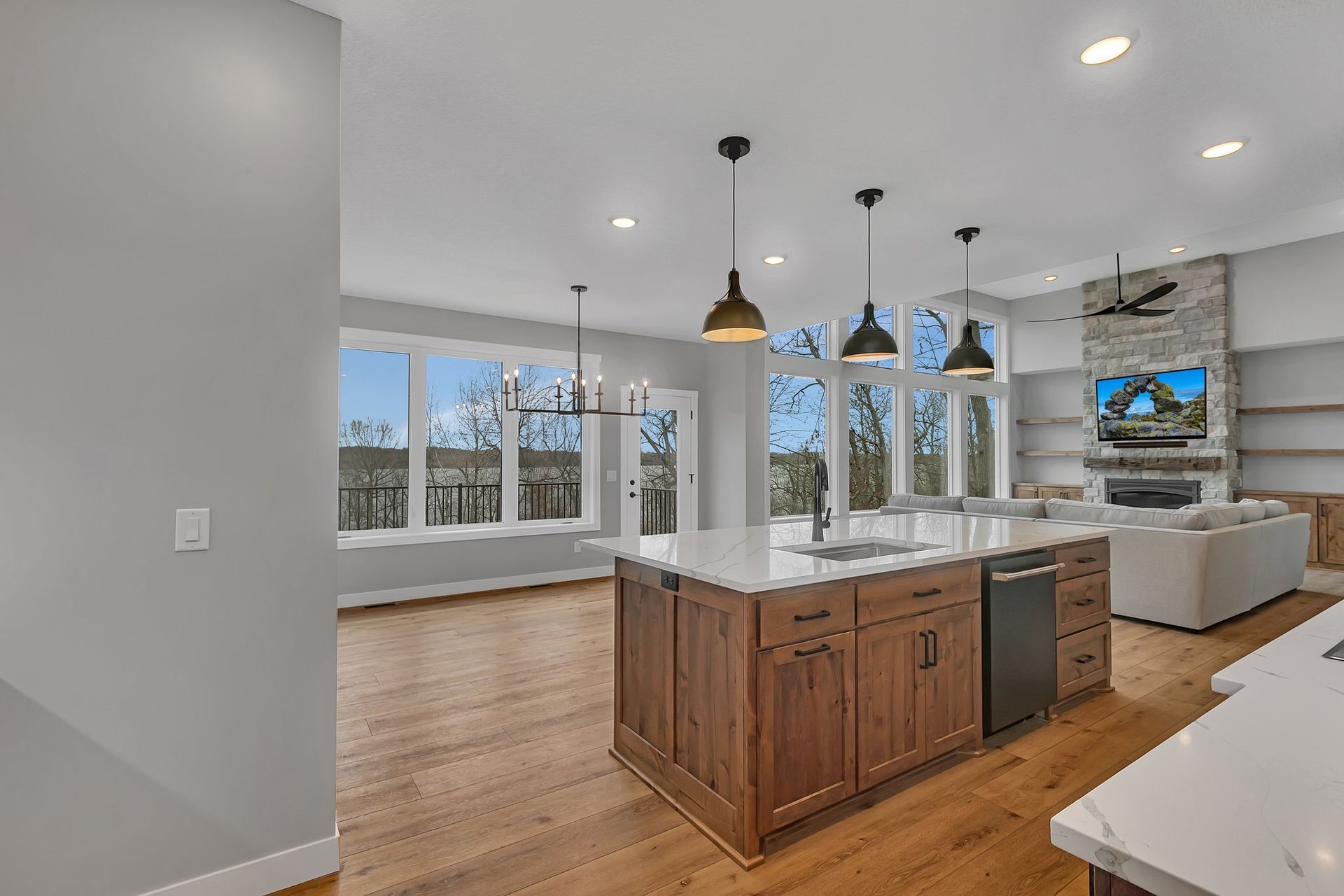 A kitchen with a large island in the middle of the room.