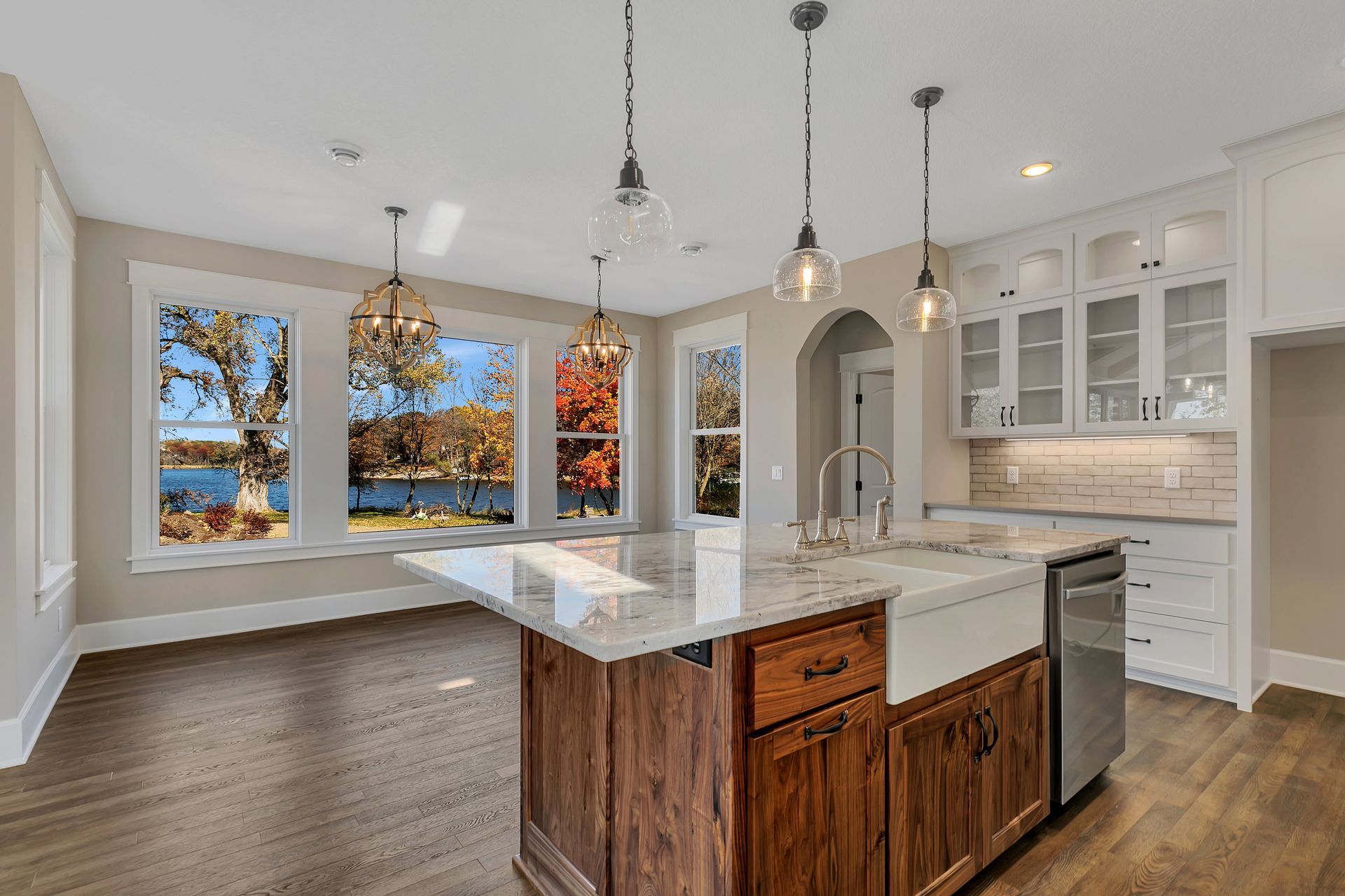 There is a large island in the middle of the kitchen.
