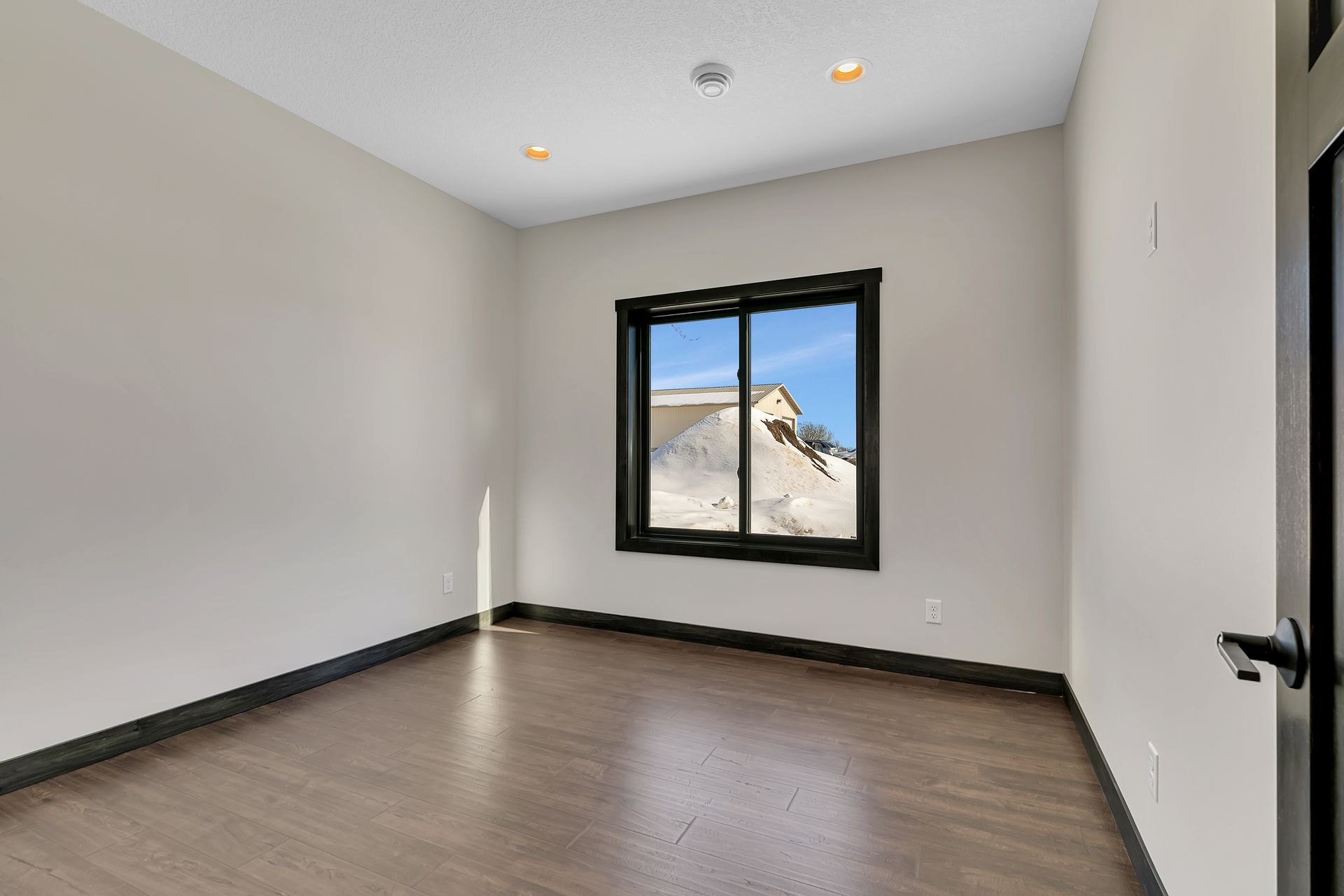 There is a large window in the middle of the room.