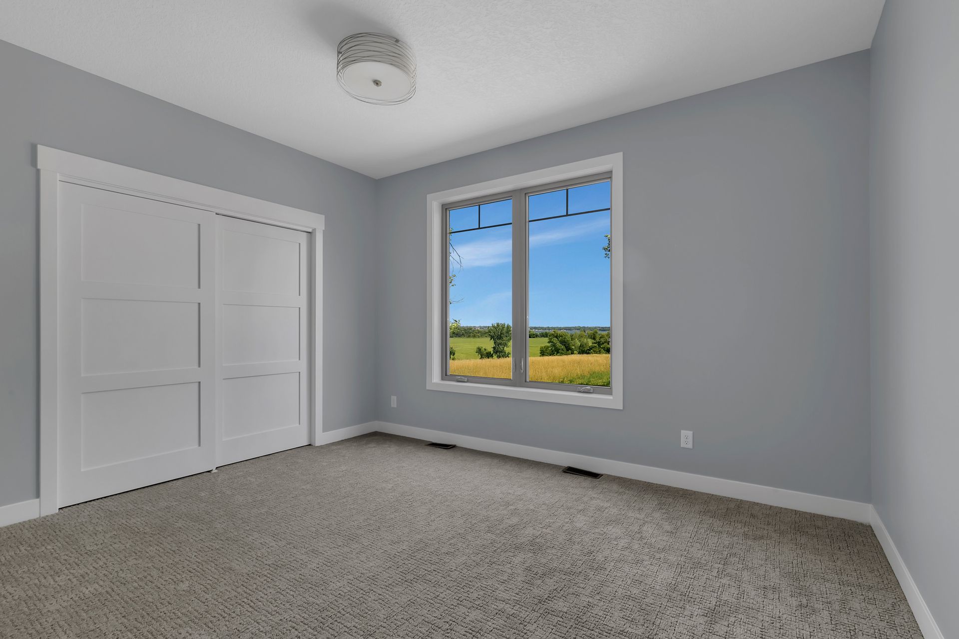 There is a large window in the middle of the room.