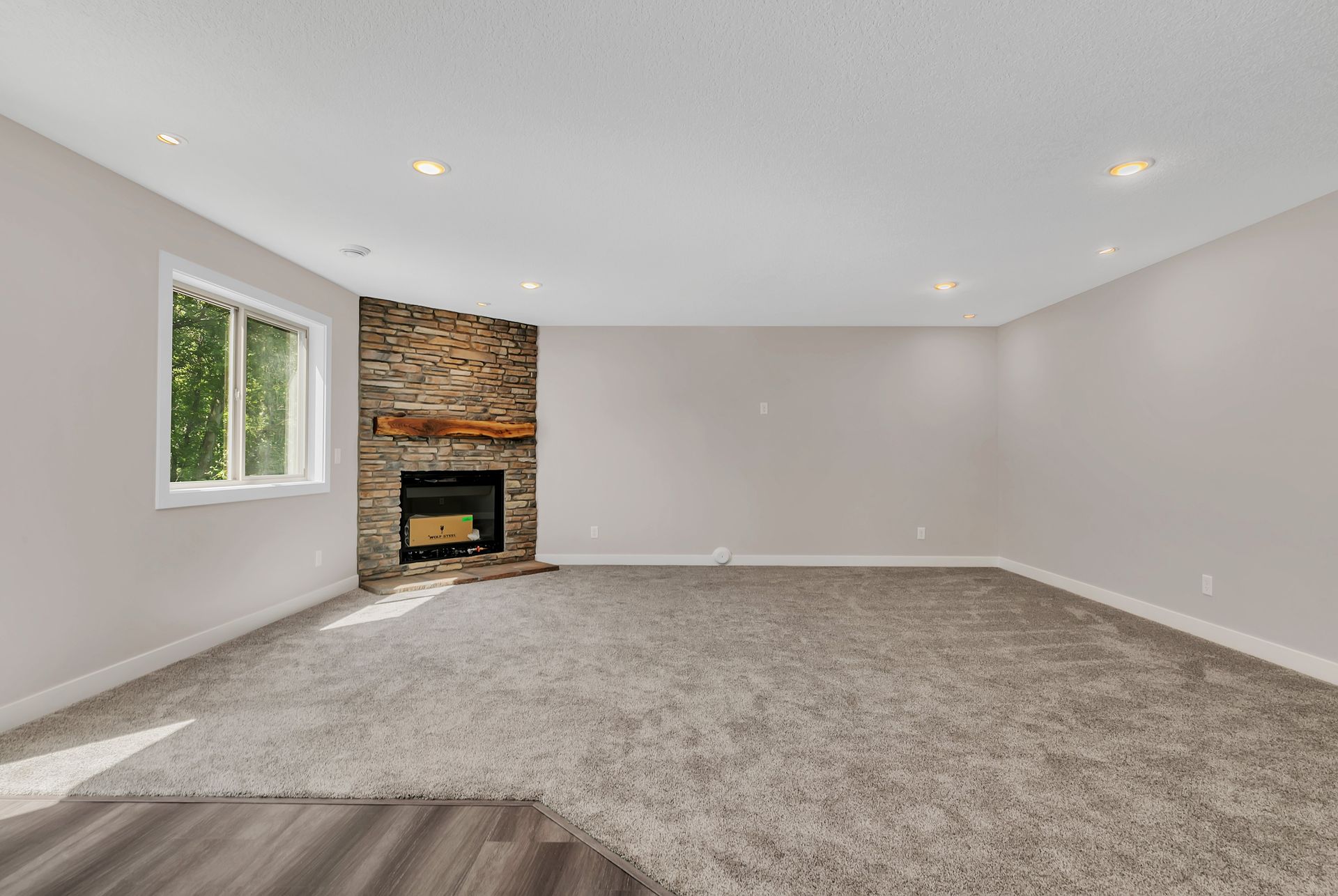 There is a fireplace in the middle of the room.