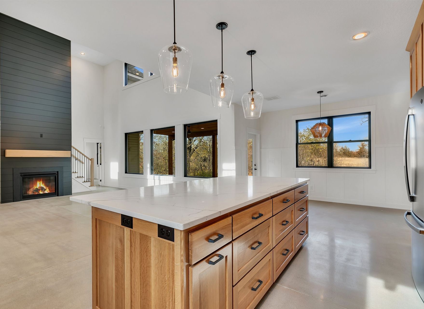 There is a large island in the middle of the kitchen.