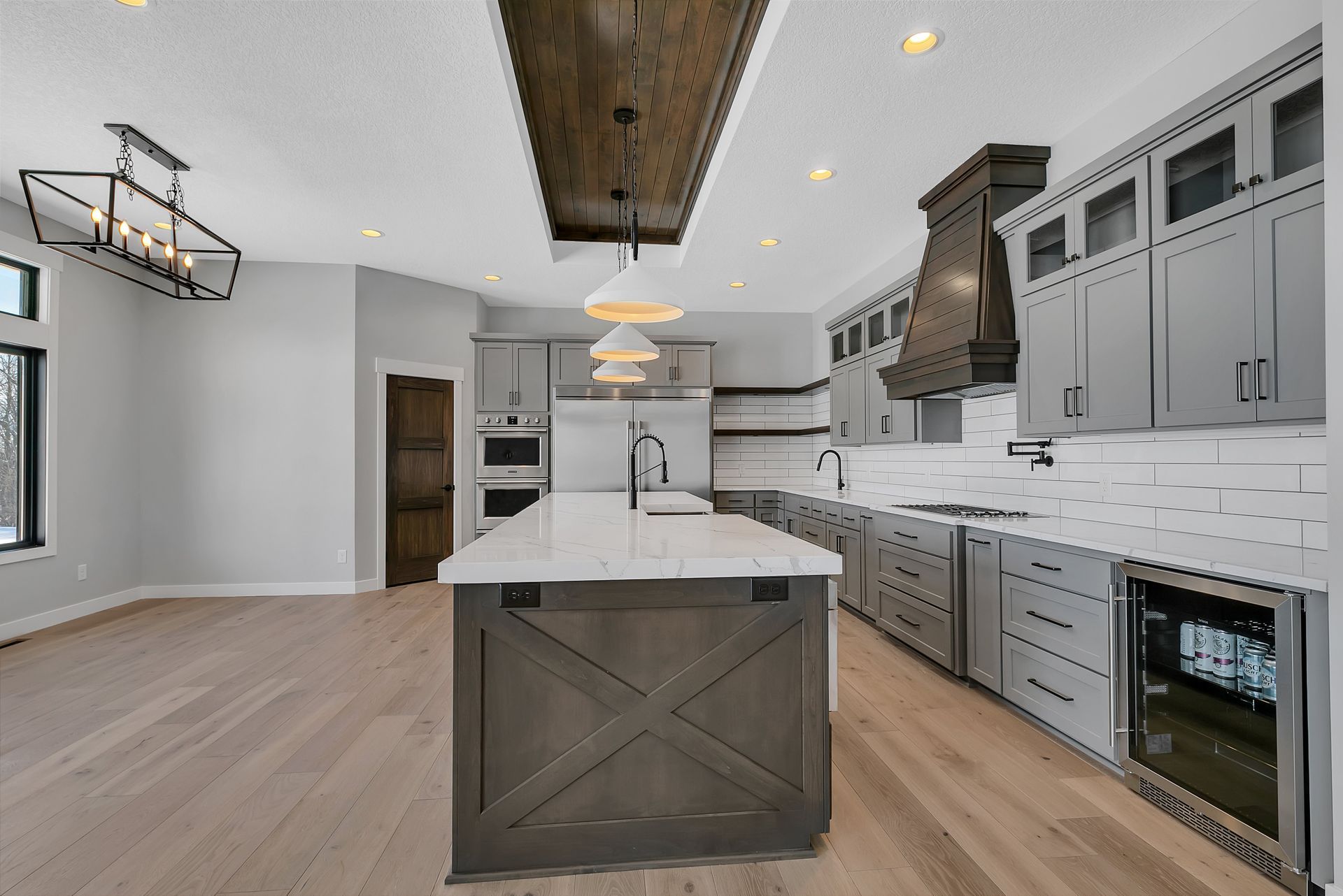 There is a large island in the middle of the kitchen.