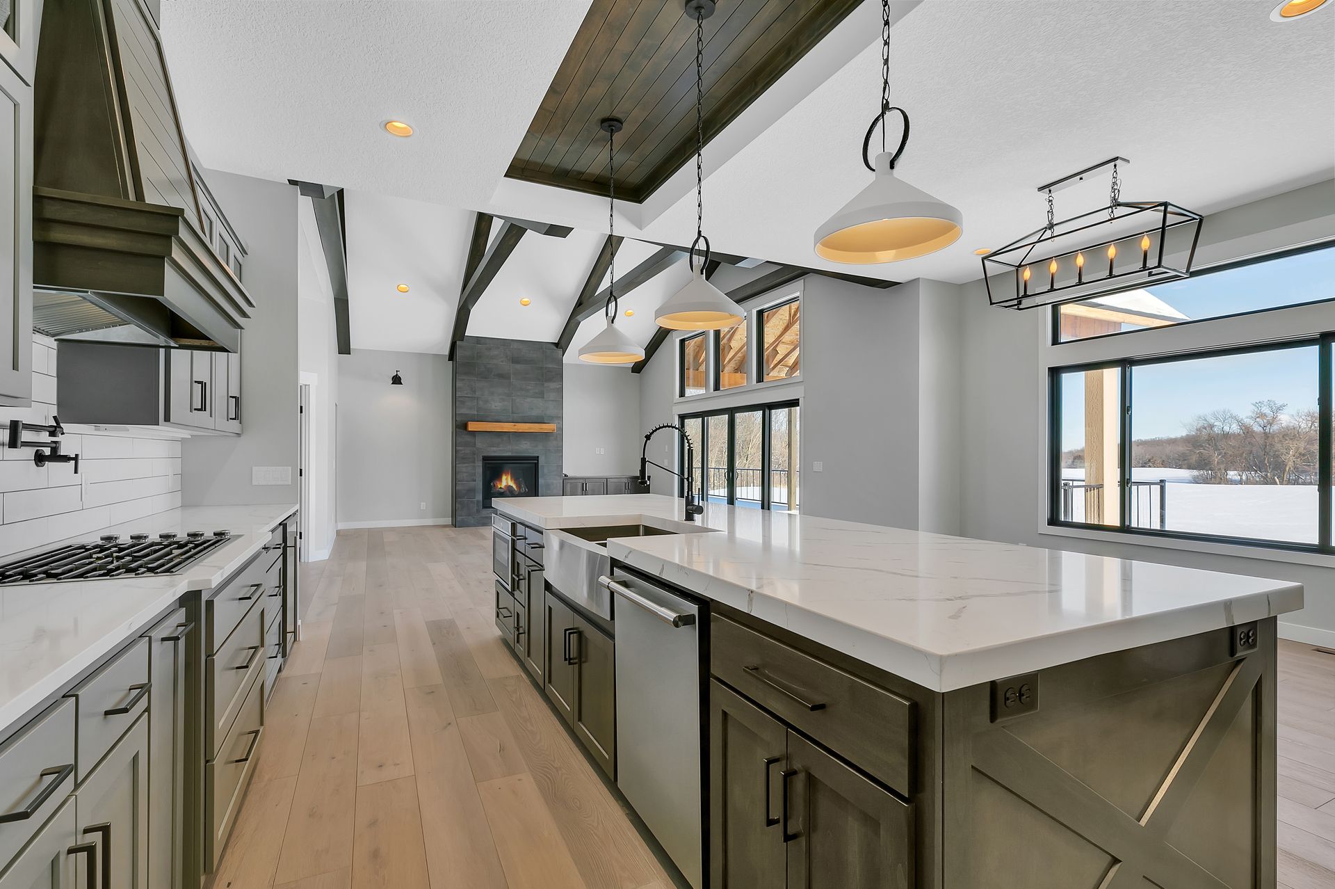 A kitchen with a large island in the middle of it
