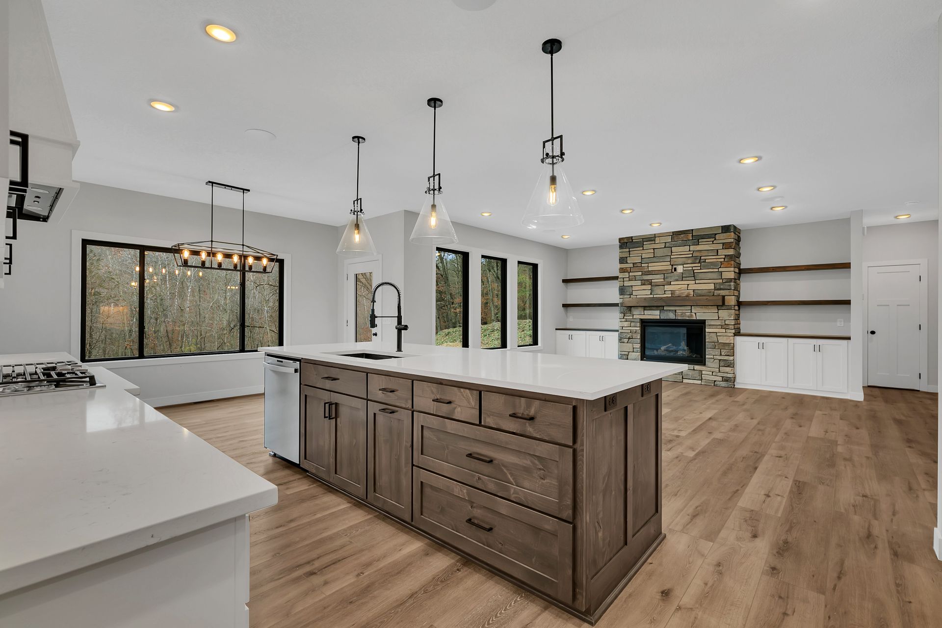 There is a large island in the middle of the kitchen.