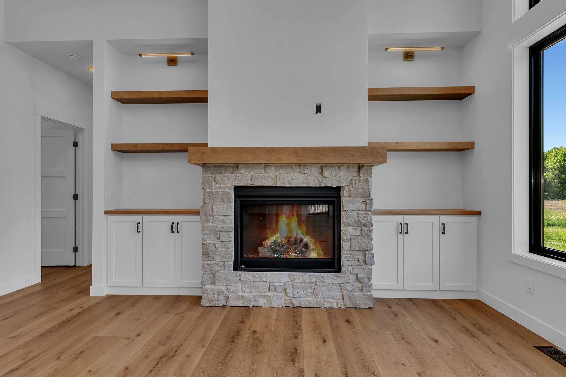 There is a fireplace in the middle of the room.