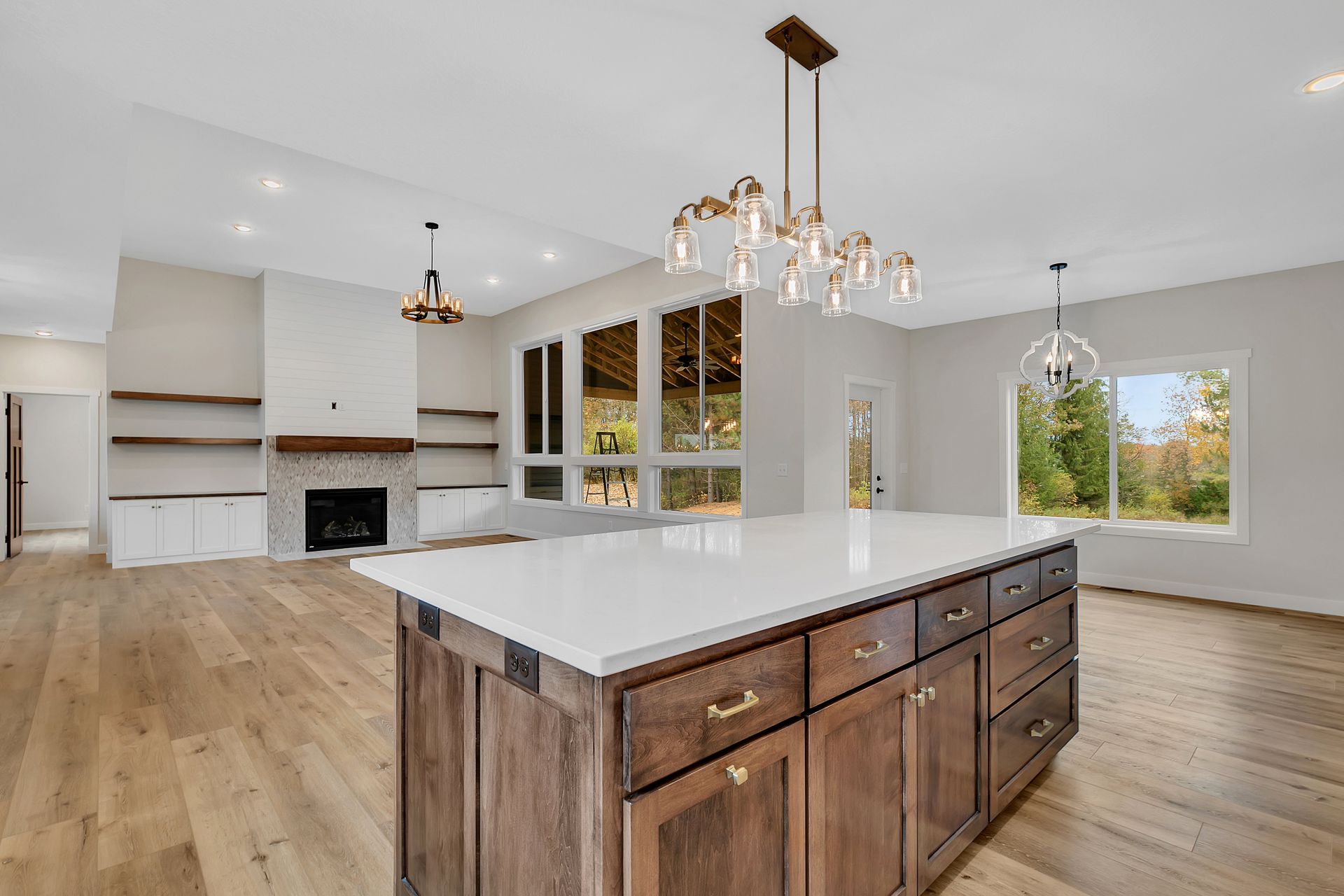 There is a large island in the middle of the kitchen.