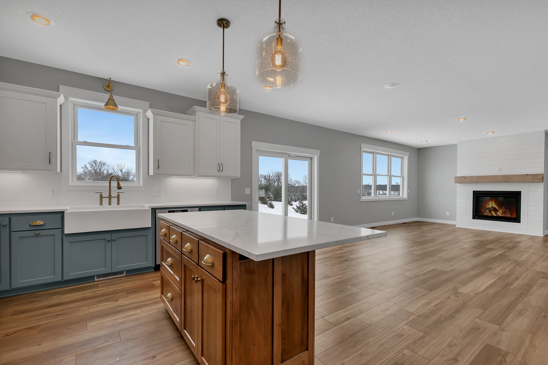 There is a large island in the middle of the kitchen.