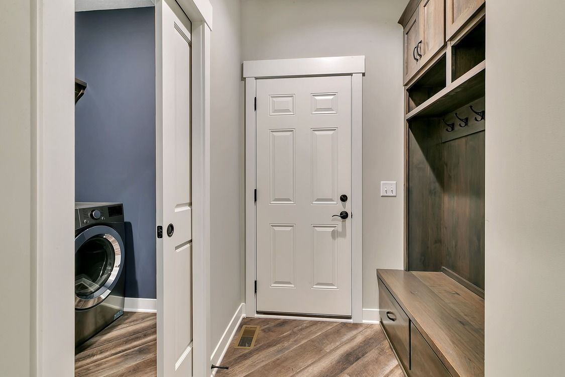 There is a washer and dryer in the laundry room.