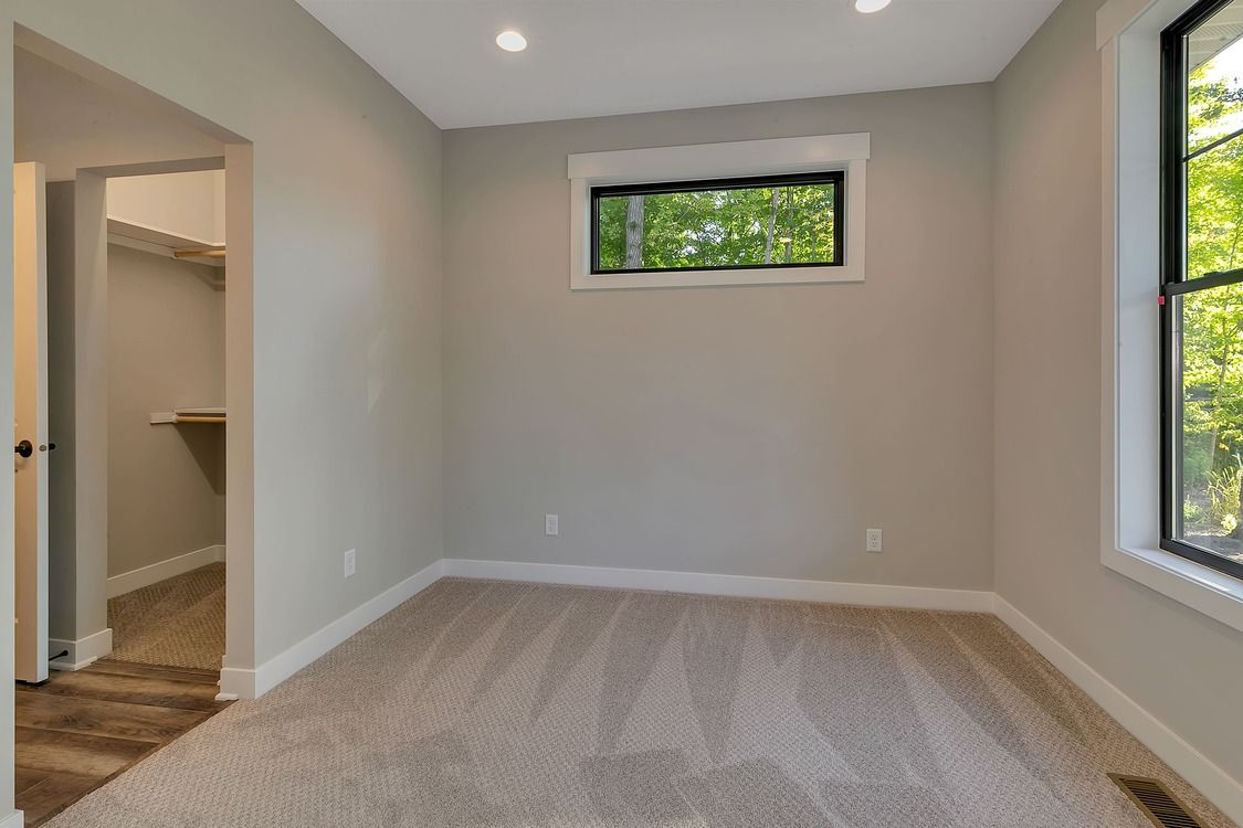 There is a window in the corner of the room.