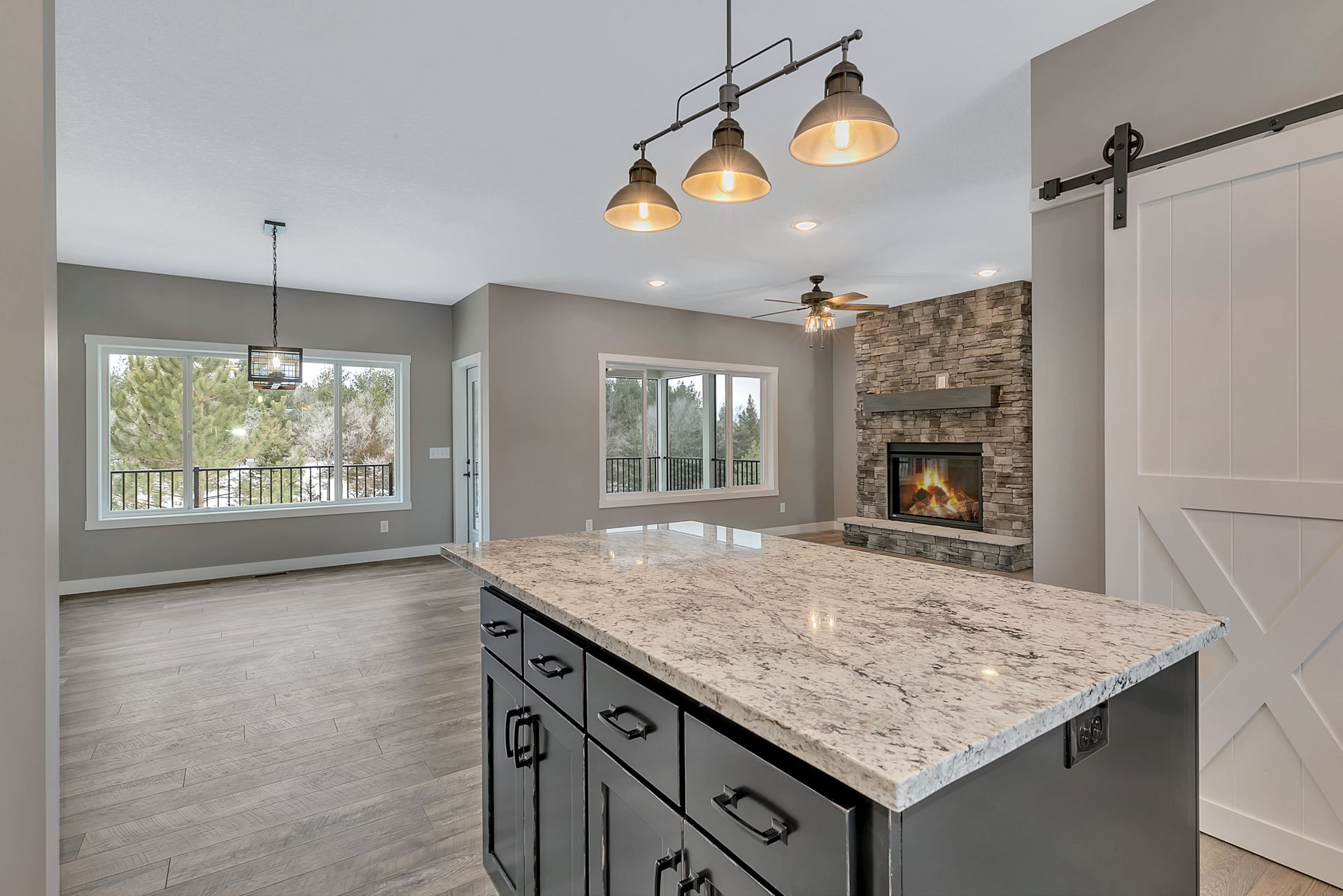 There is a large island in the middle of the kitchen.
