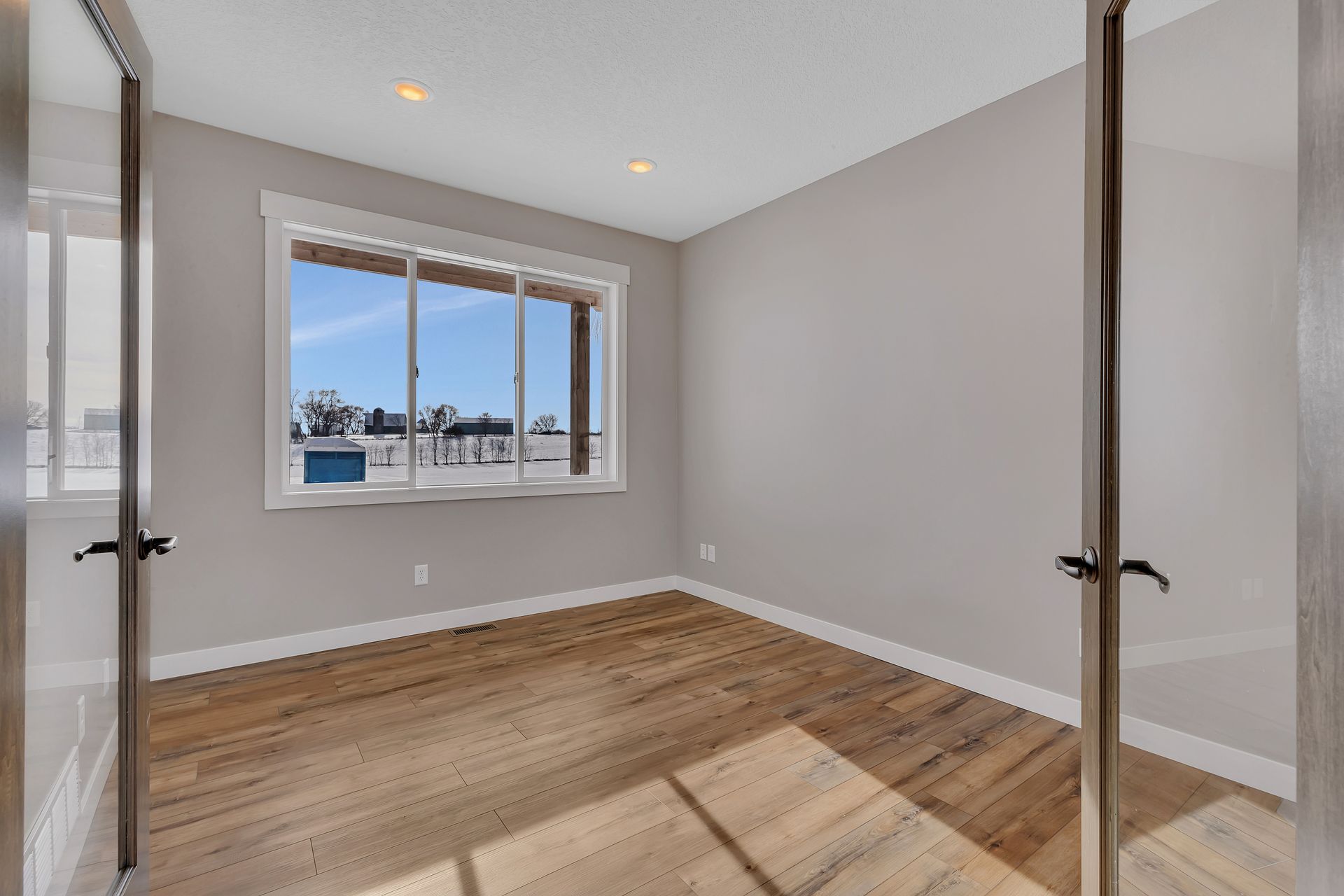 There is a large window in the middle of the room.