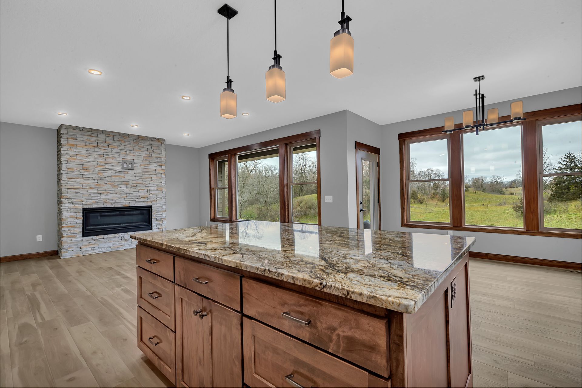 There is a large island in the middle of the kitchen.