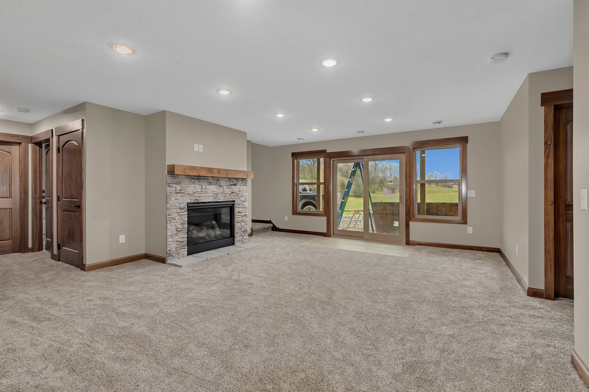 There is a fireplace in the middle of the room.