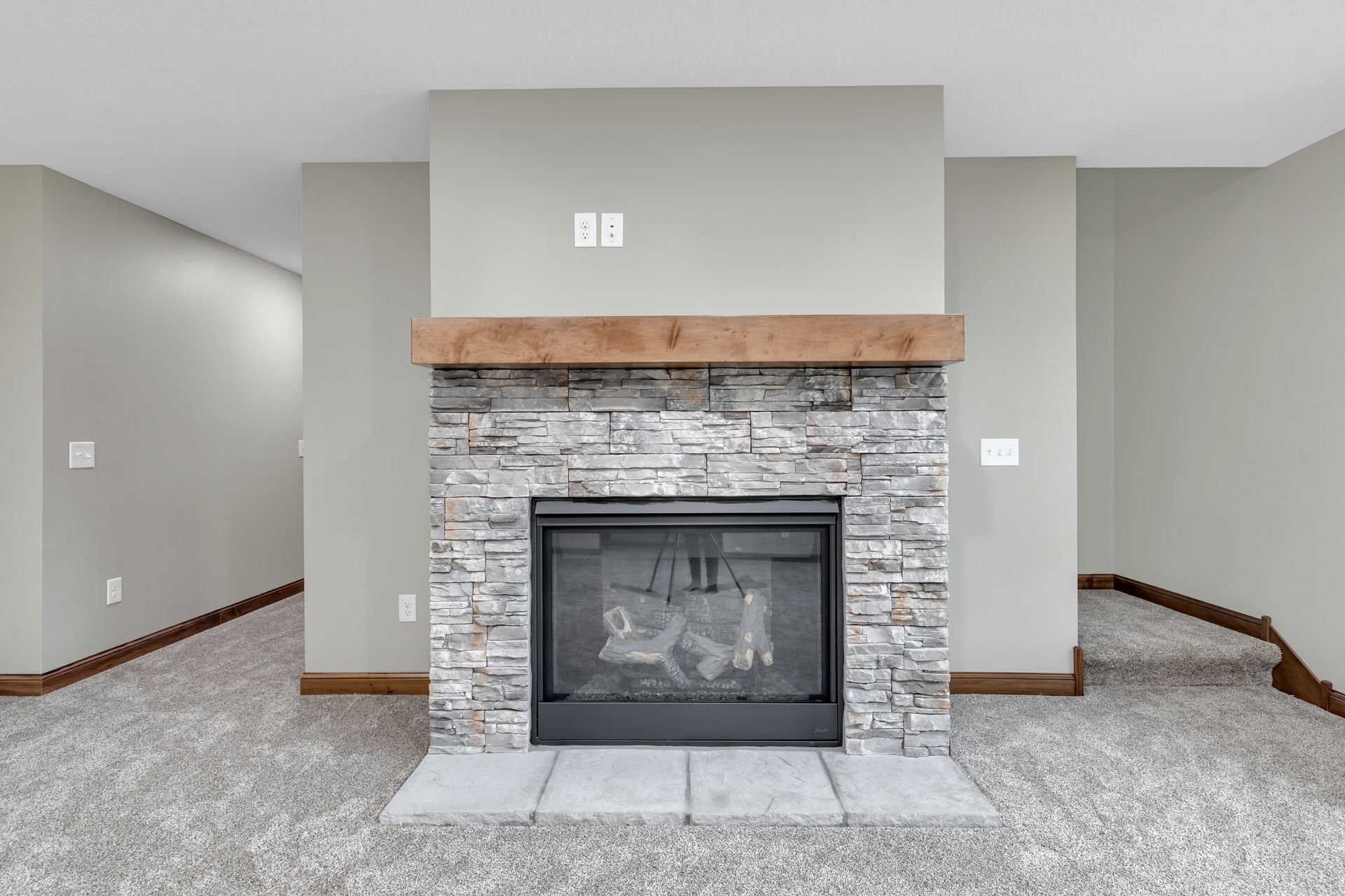There is a fireplace in the middle of the room.