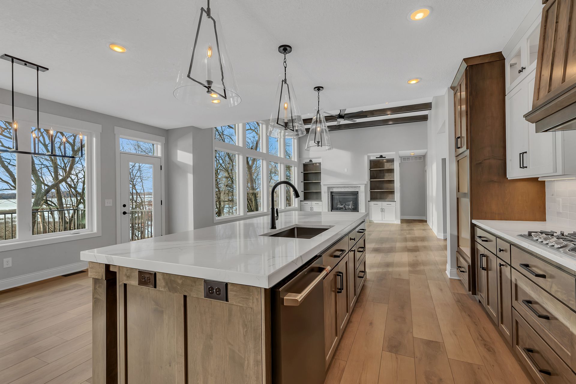 There is a large island in the middle of the kitchen.