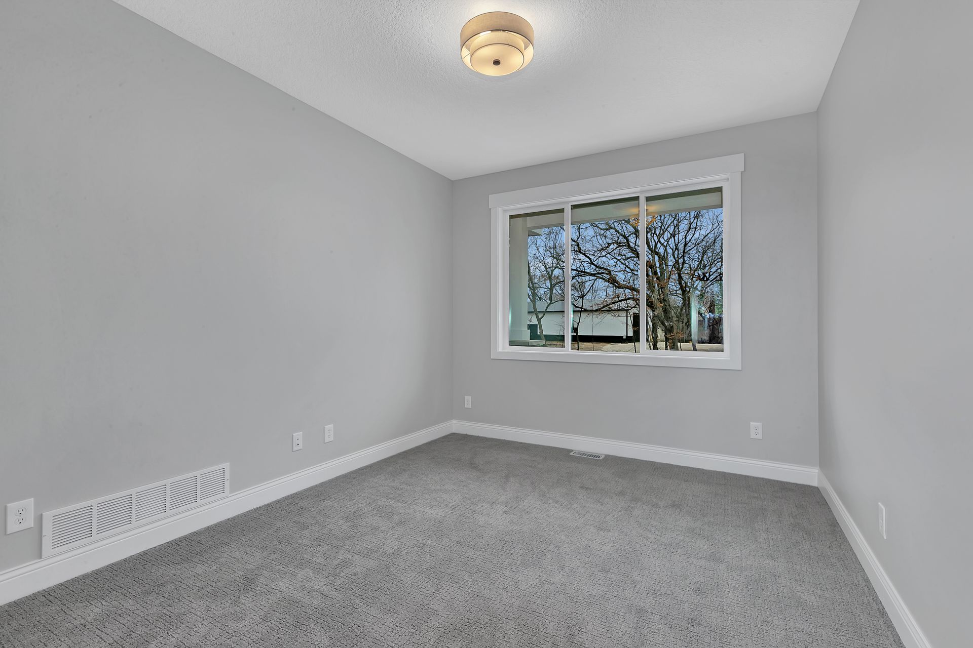 There is a large window in the middle of the room.