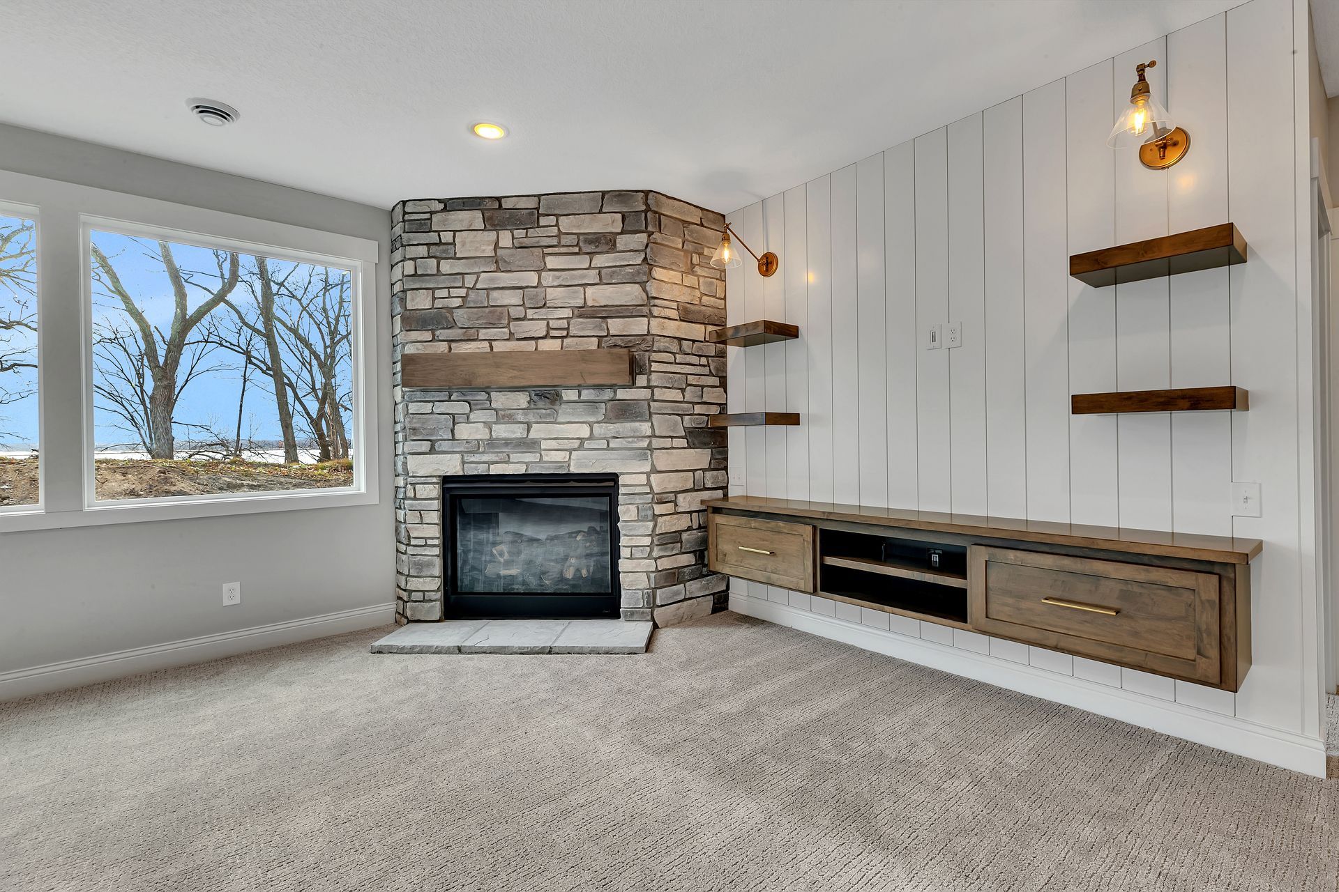 There is a fireplace in the middle of the room.