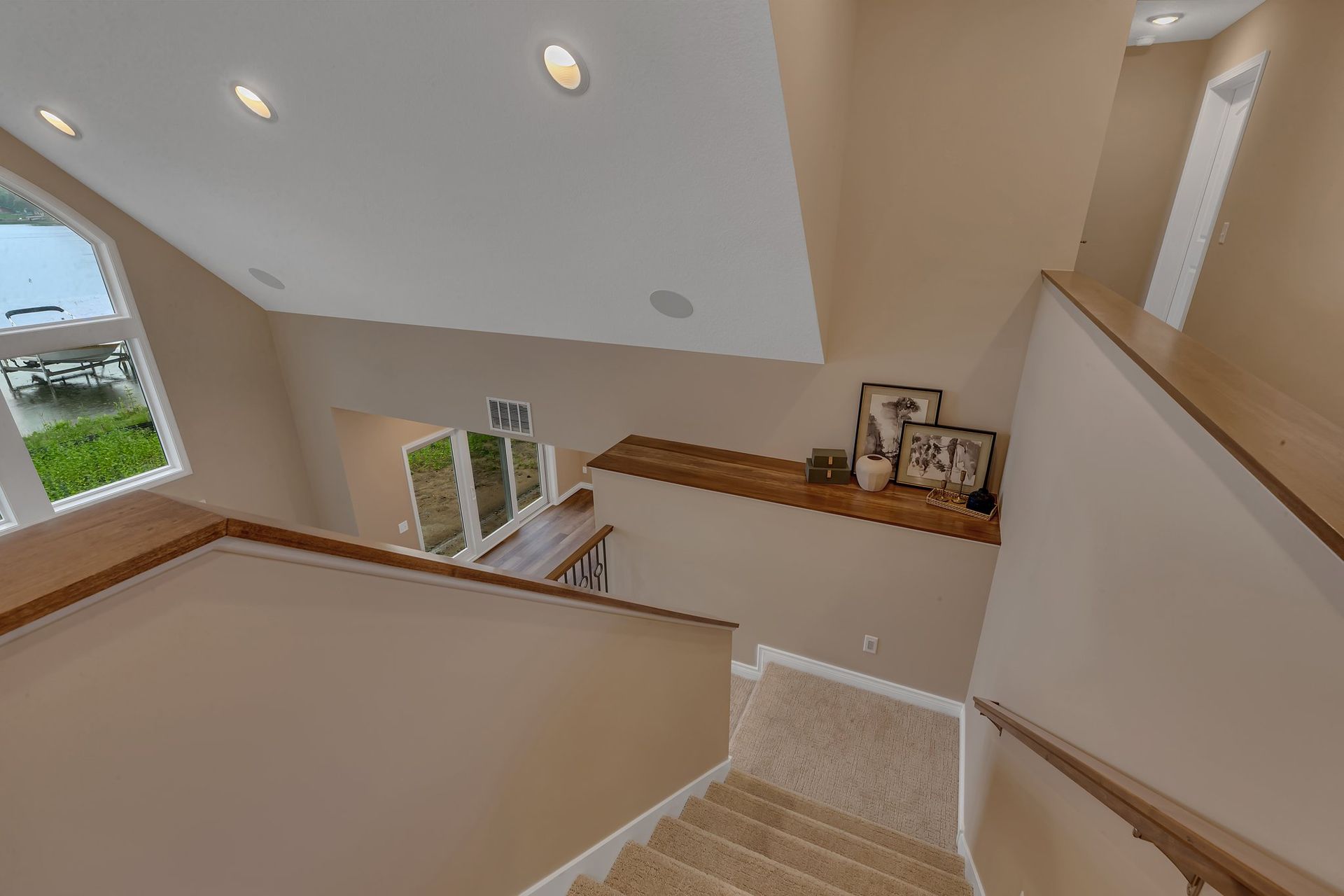 A view of the stairs leading up to the second floor of a house.