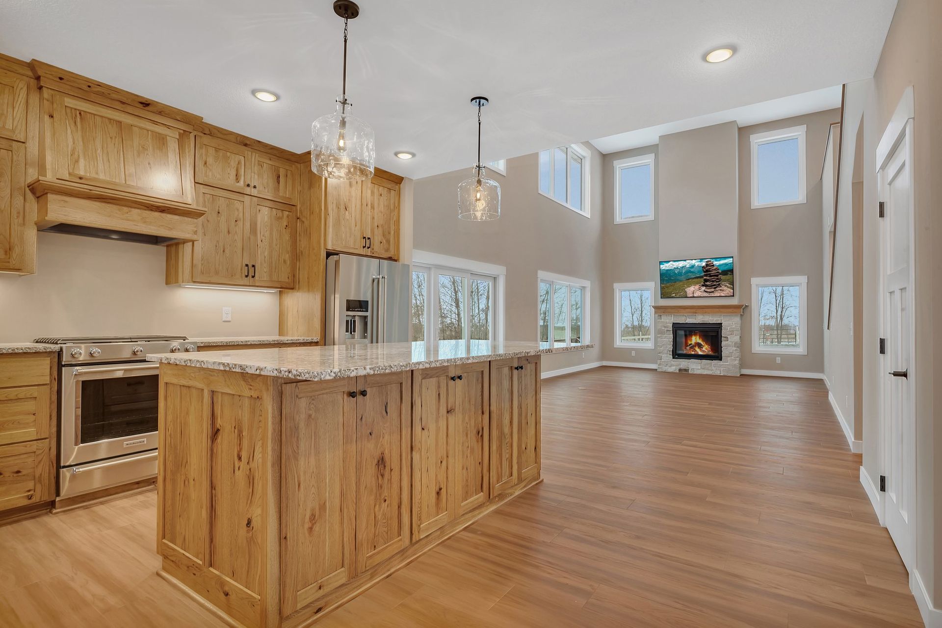 There is a large island in the middle of the kitchen.