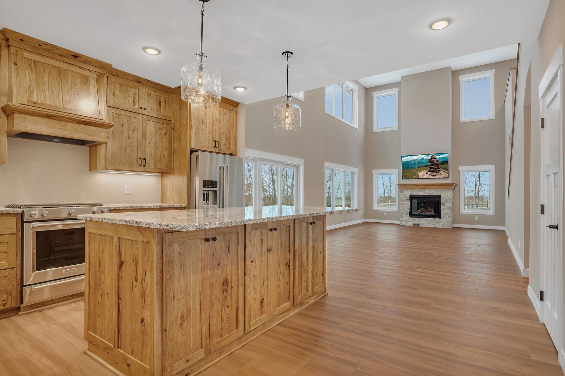 There is a large island in the middle of the kitchen.