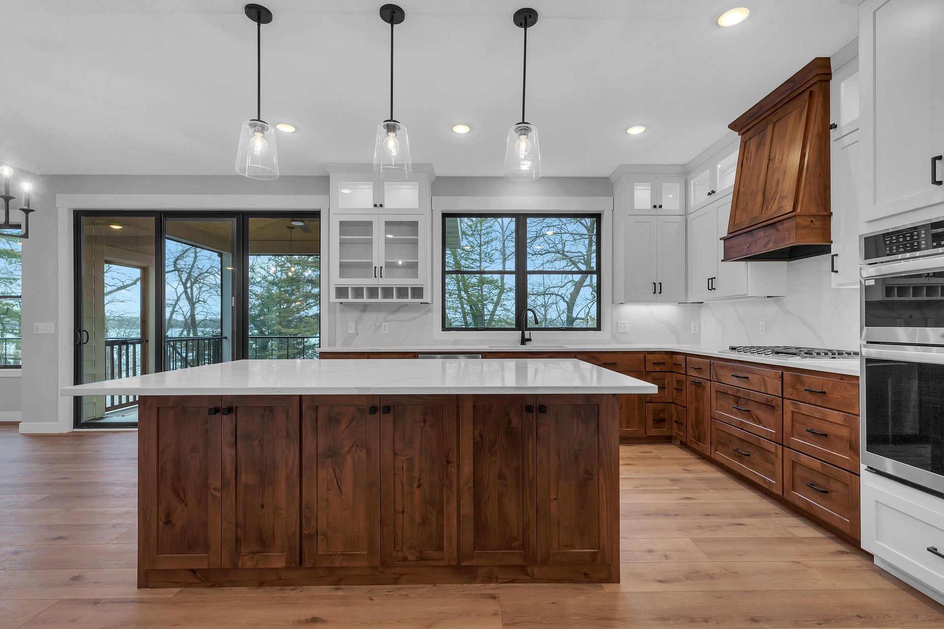 There is a large island in the middle of the kitchen.