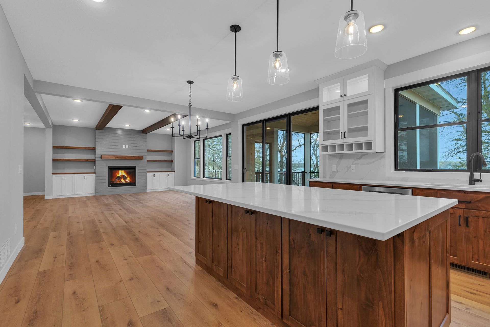There is a large island in the middle of the kitchen.