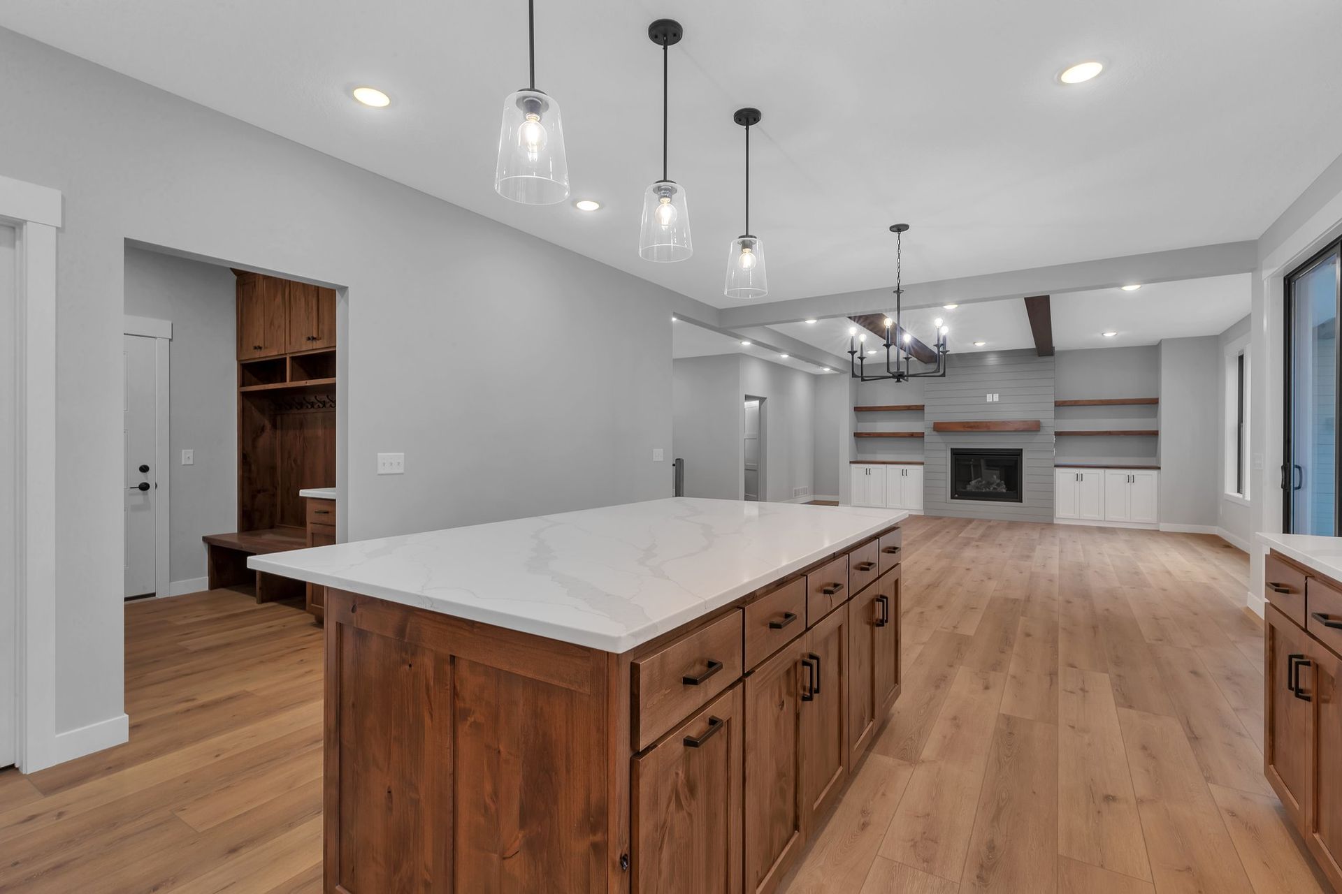 There is a large island in the middle of the kitchen.