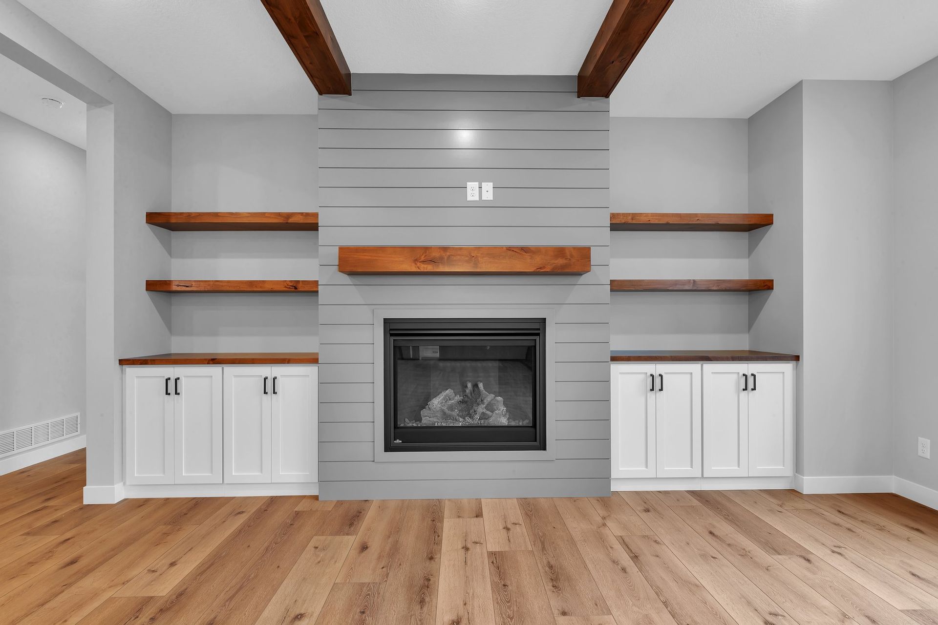 There is a fireplace in the middle of the room.