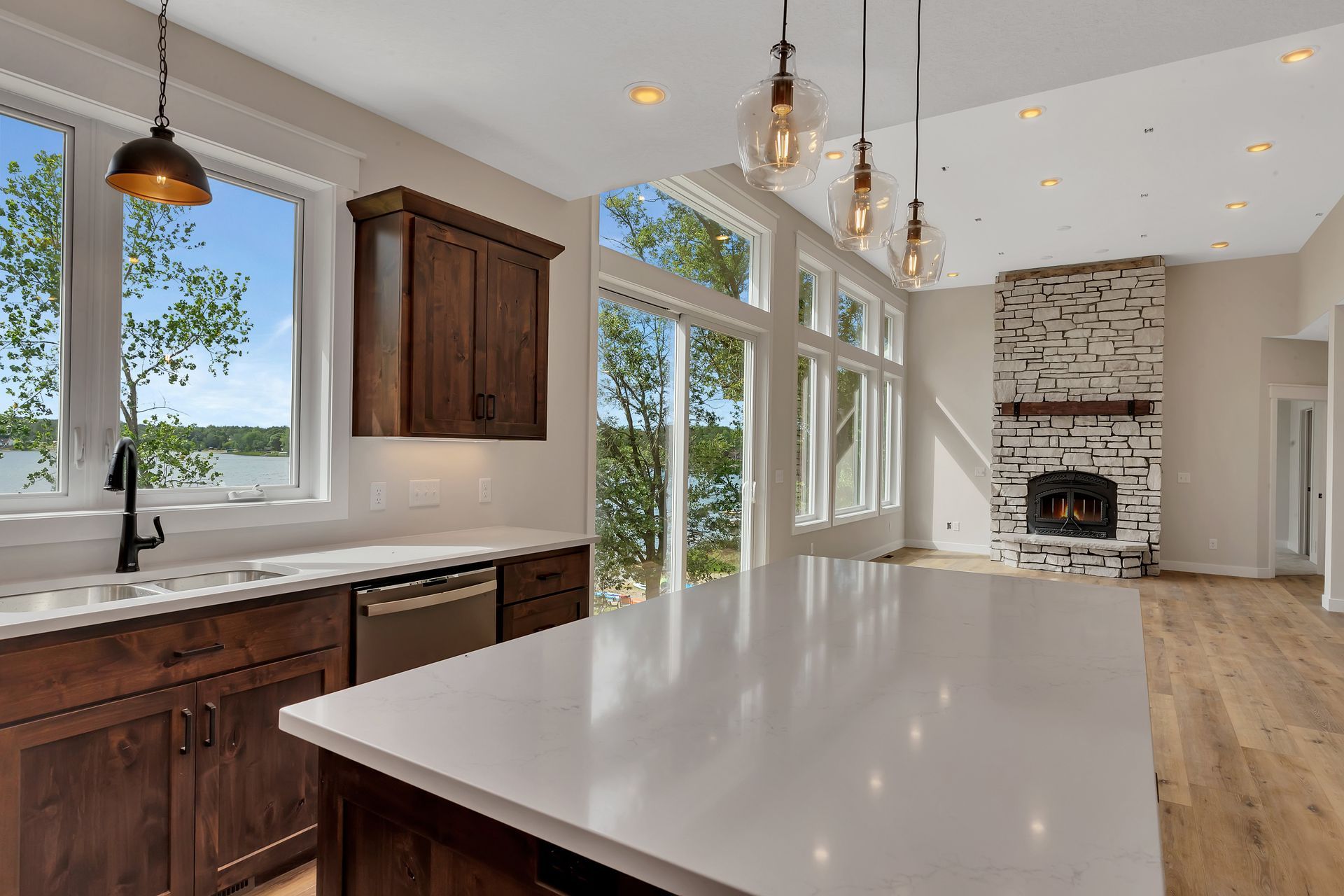 There is a large island in the middle of the kitchen.