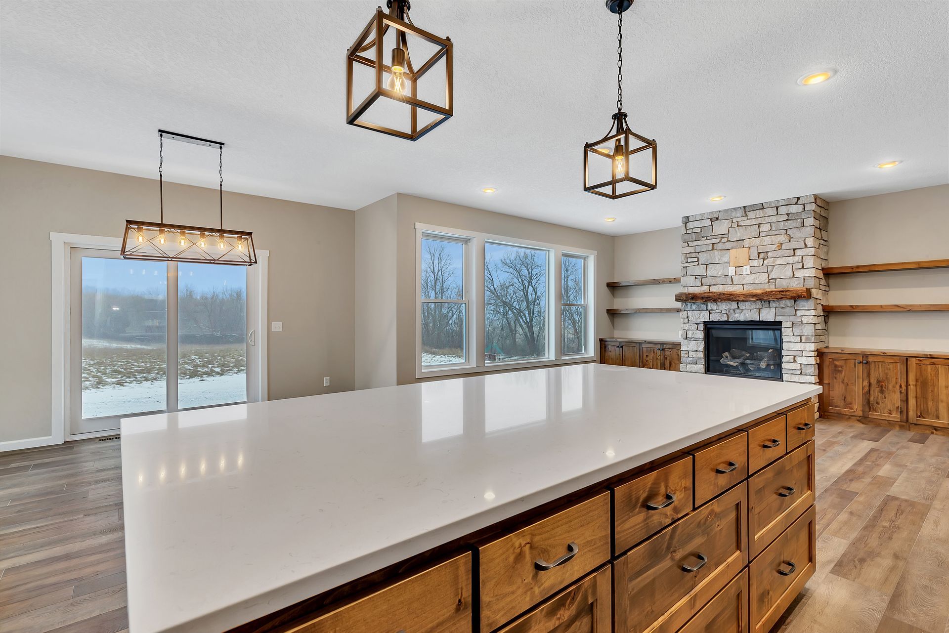 There is a large island in the middle of the kitchen.