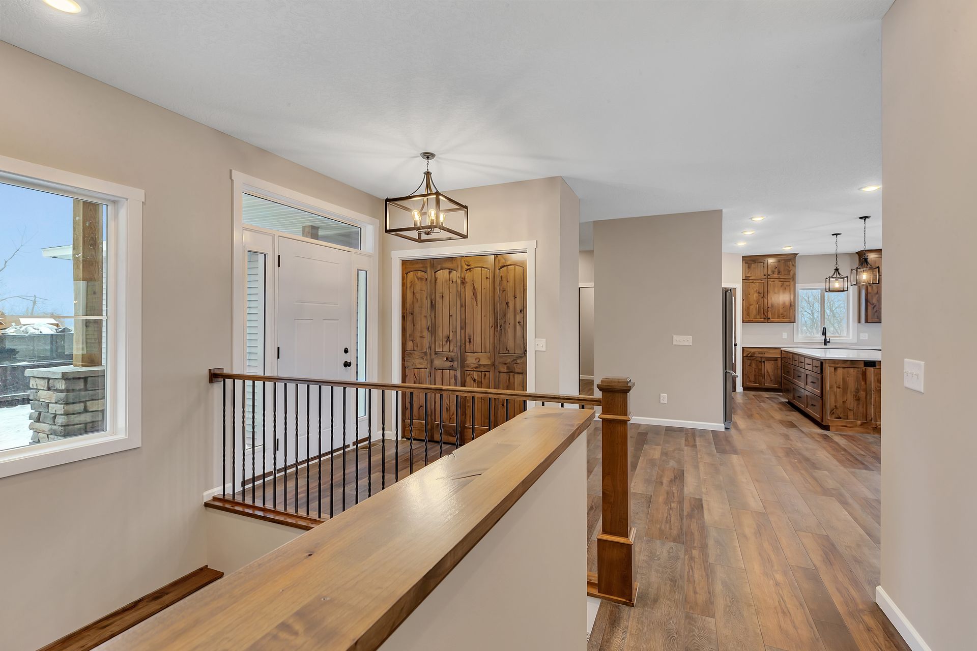 There is a staircase leading up to the second floor of a house.