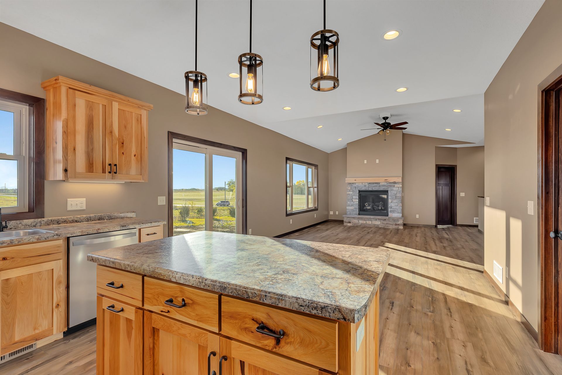 There is a large island in the middle of the kitchen.