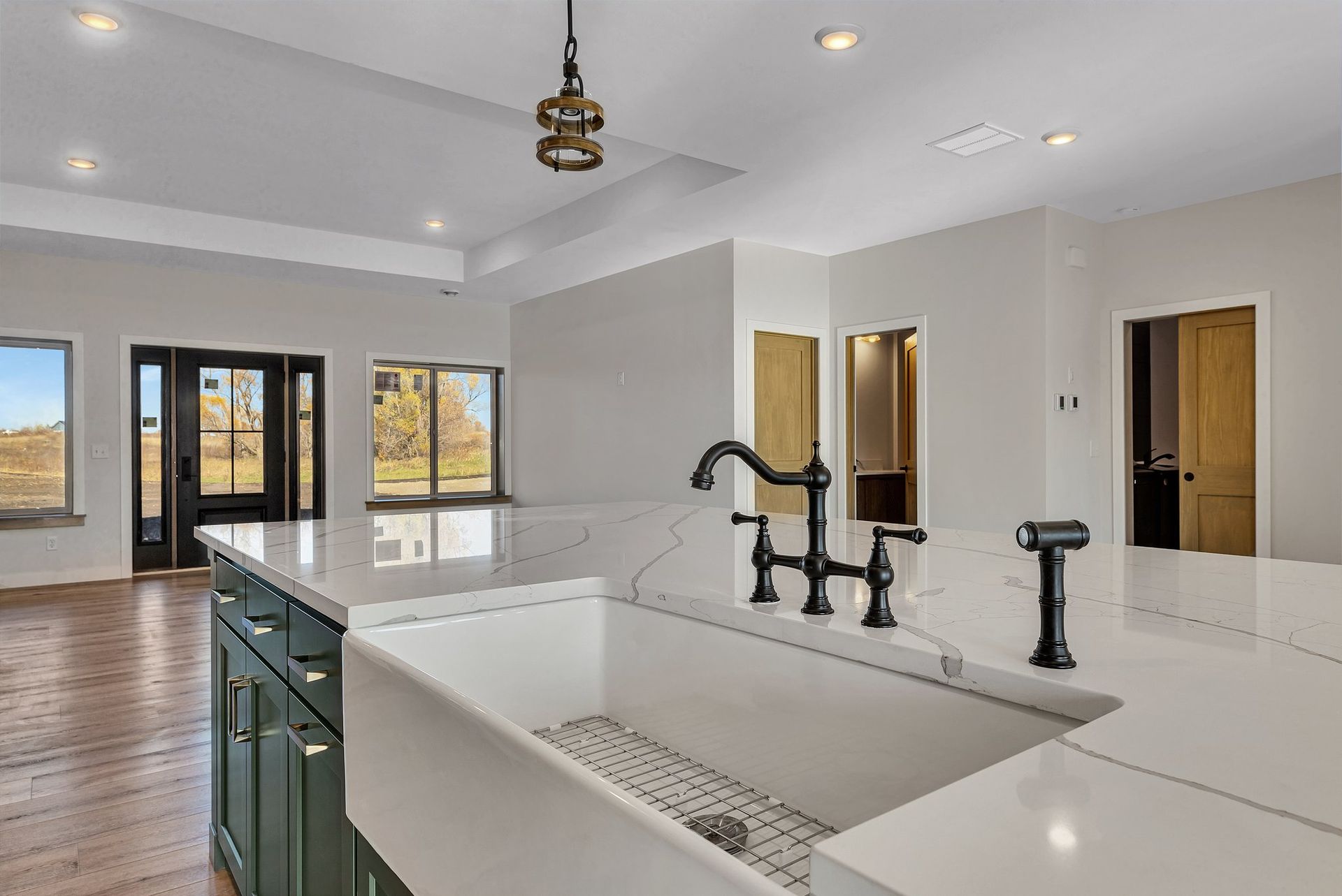 A kitchen with a sink and a faucet in it.