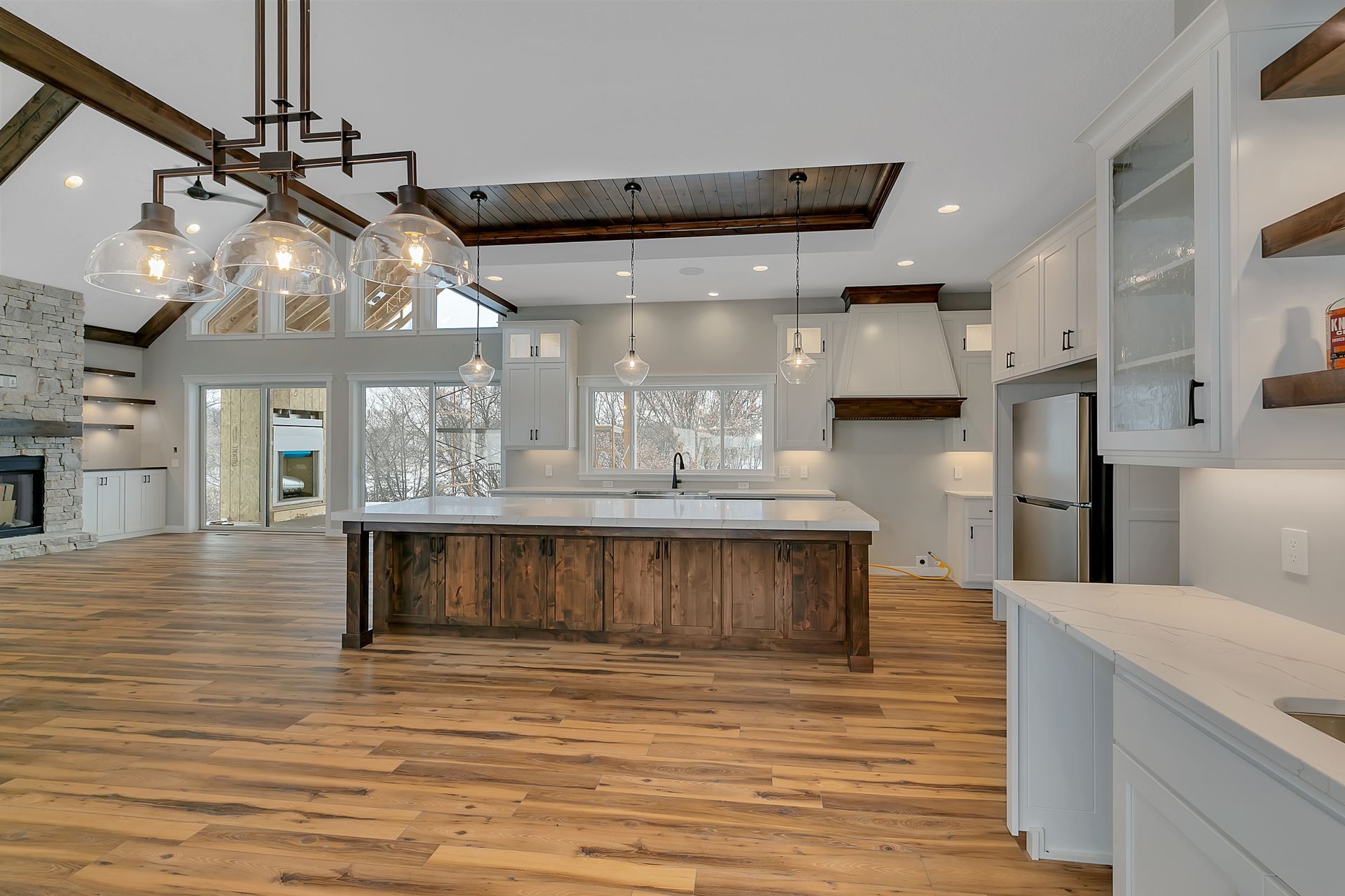 There is a large island in the middle of the kitchen.