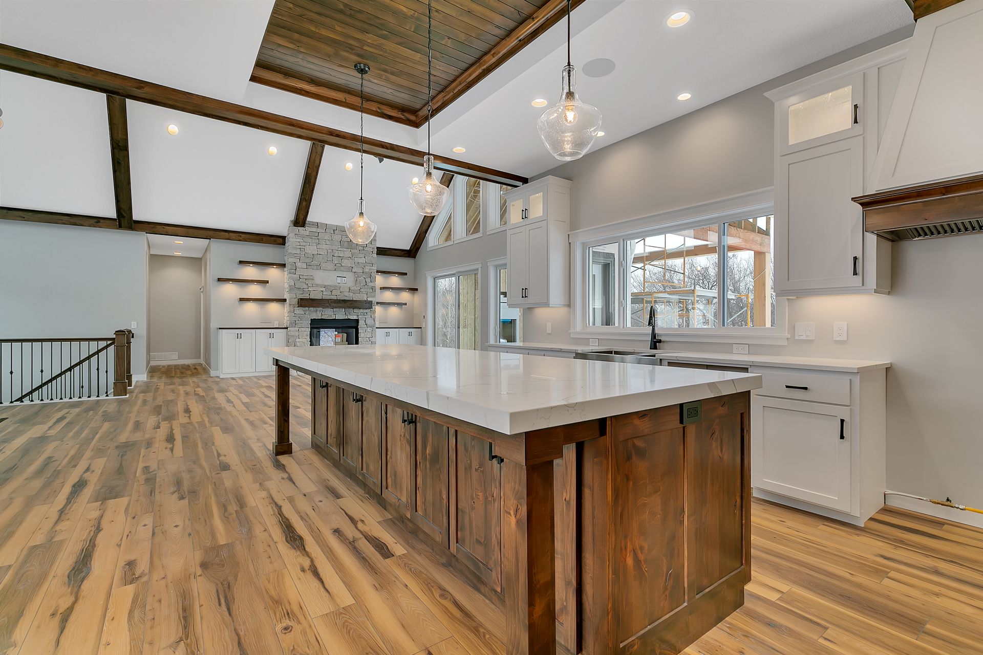 There is a large island in the middle of the kitchen.