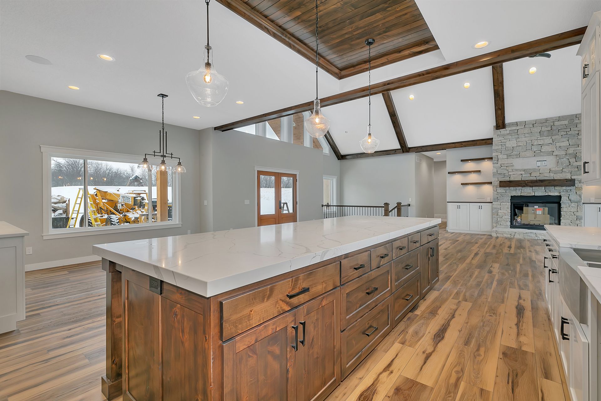 There is a large island in the middle of the kitchen.