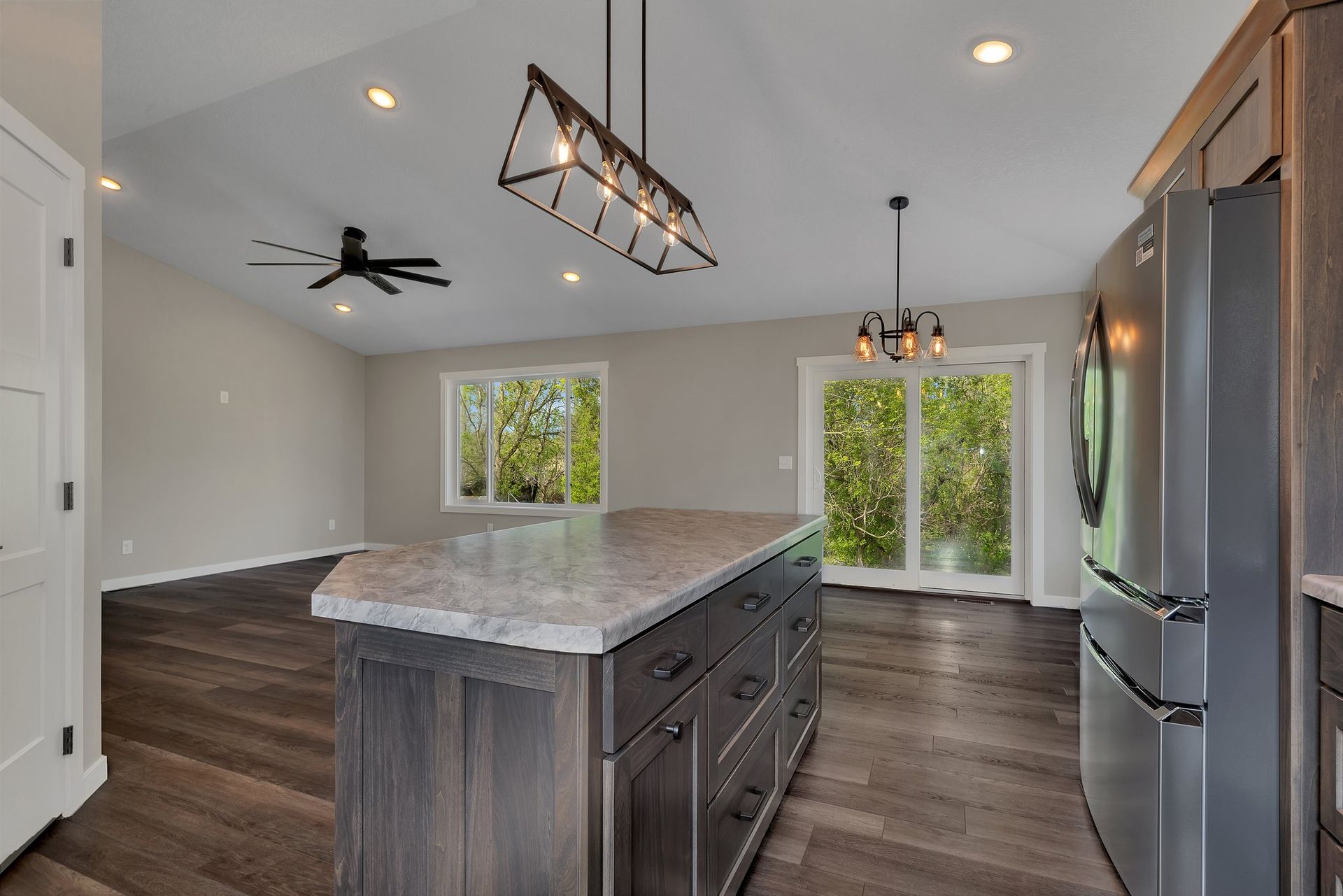 There is a large island in the middle of the kitchen.