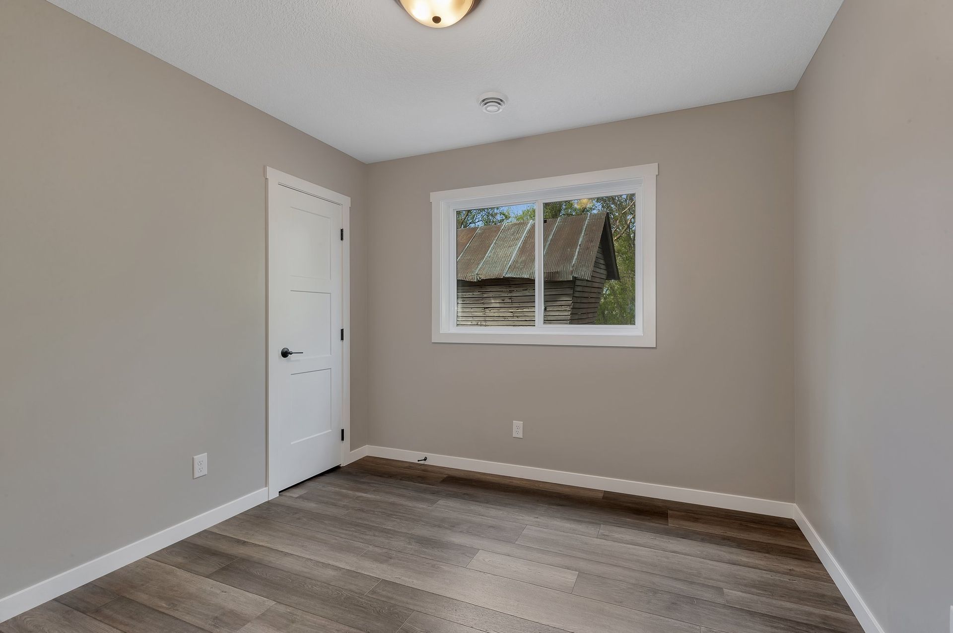 There is a window in the middle of the room.