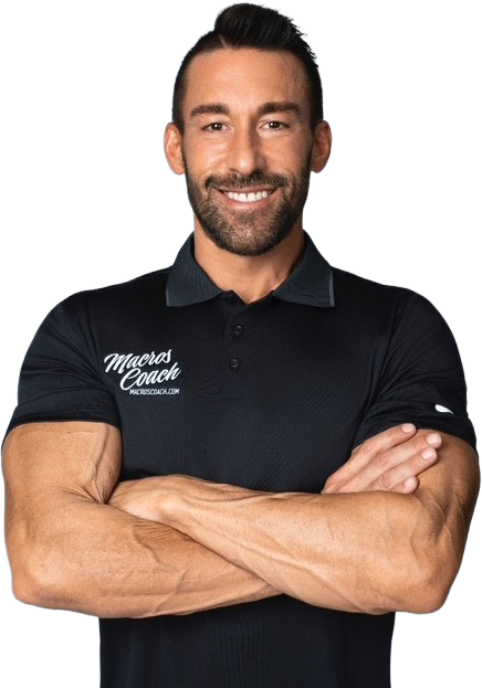 Man with muscular arms, smiling with arms crossed, wearing a black shirt with 