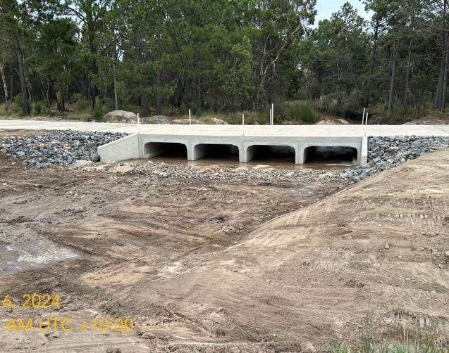 A Bridge is Being Built Over a Body of Water — Lohman Contracting in Emerald, QLD