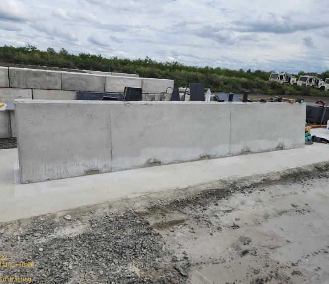A Large Concrete Block is Sitting on the Side of a Road — Lohman Contracting in Emerald, QLD