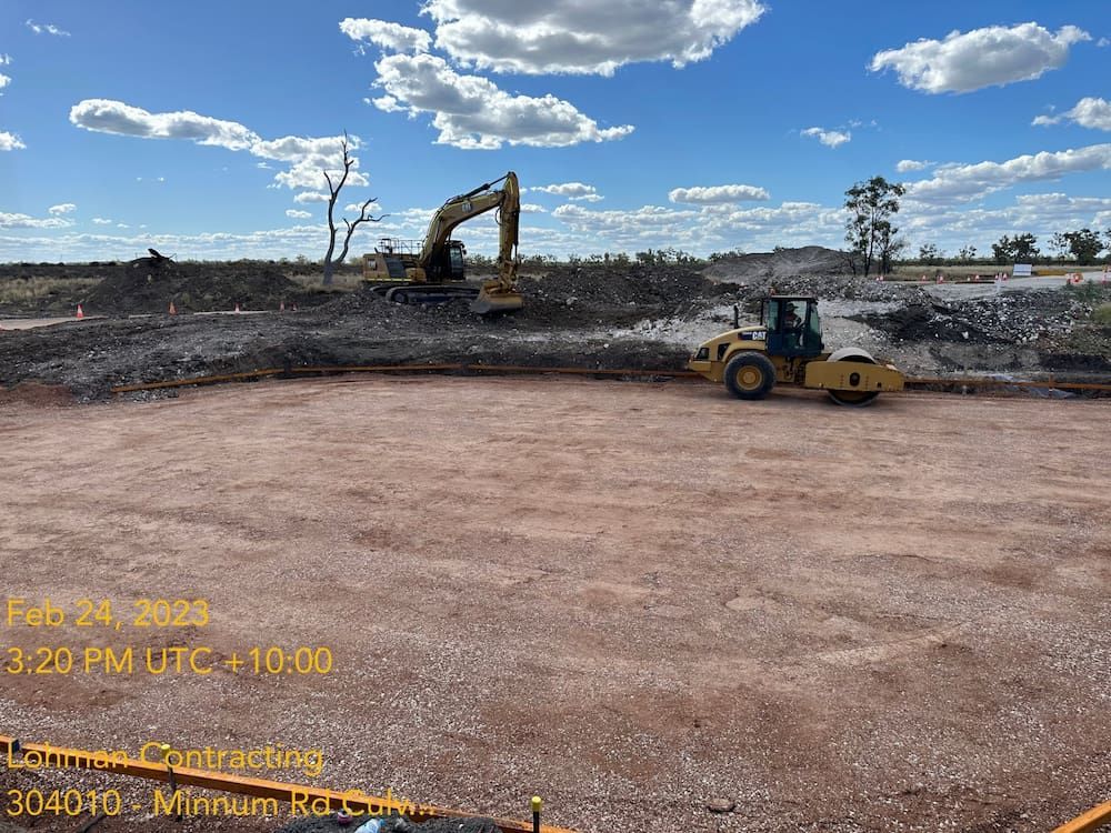 A Construction Site With A Bulldozer And A Roller — Lohman Contracting in Emerald, QLD