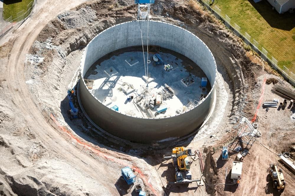 An Aerial View Of A Large Circular Structure Under Construction — Lohman Contracting in Emerald, QLD